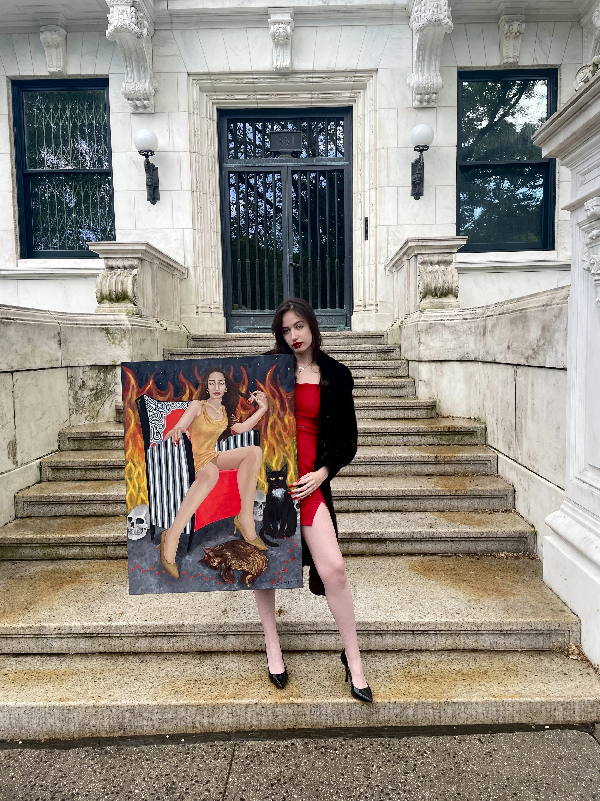 Lilah with self portrait on marble stairs