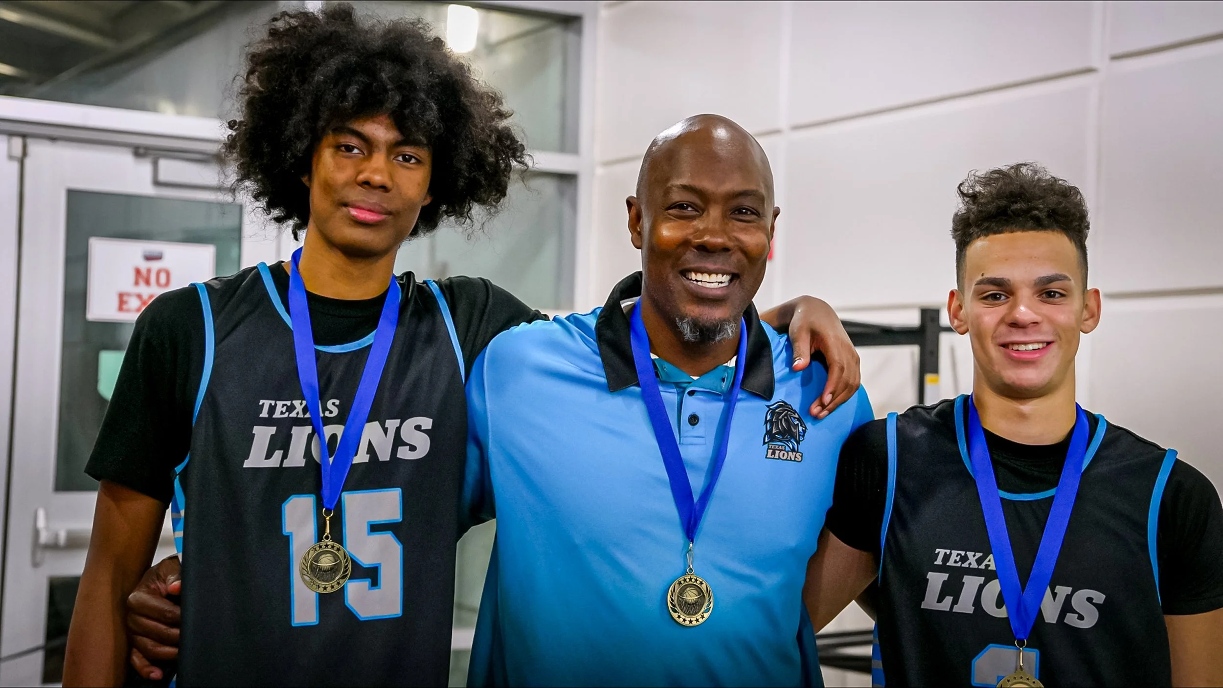 Texas Lions Alumni with Coach Leo Clark. Left to right is LJ Clark, Coach Leo, Trent Page.