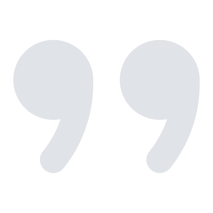 Large blue quotation marks on a black background.