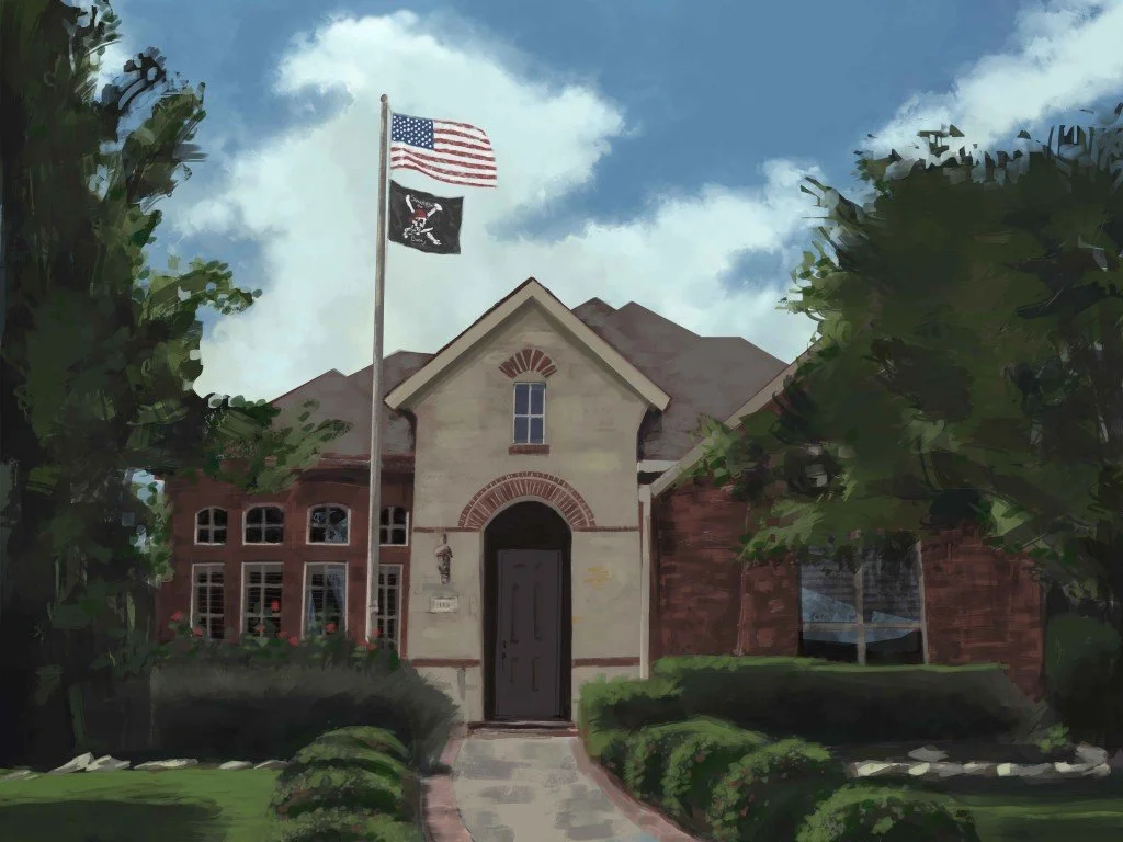 A house with a flagpole in front, flying the American flag and a POW/MIA flag. The house has a brick and beige exterior, a dark front door, and a well-kept lawn with bushes and trees.