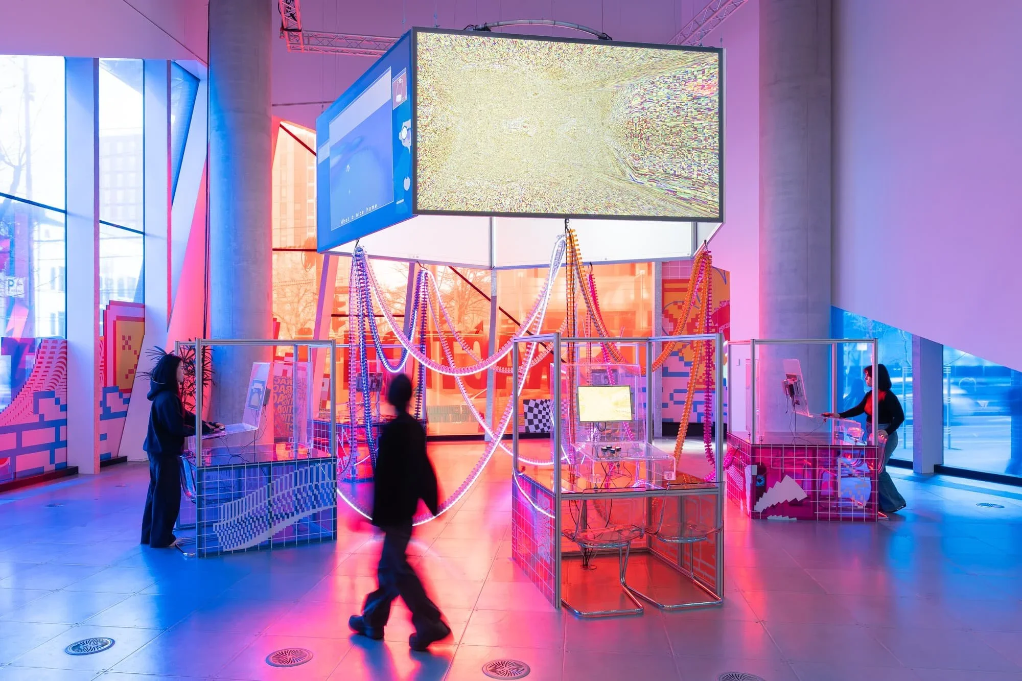 Five interactive exhibits at Science Gallery Melbourne consisting of custom hardware playing curated local digital games