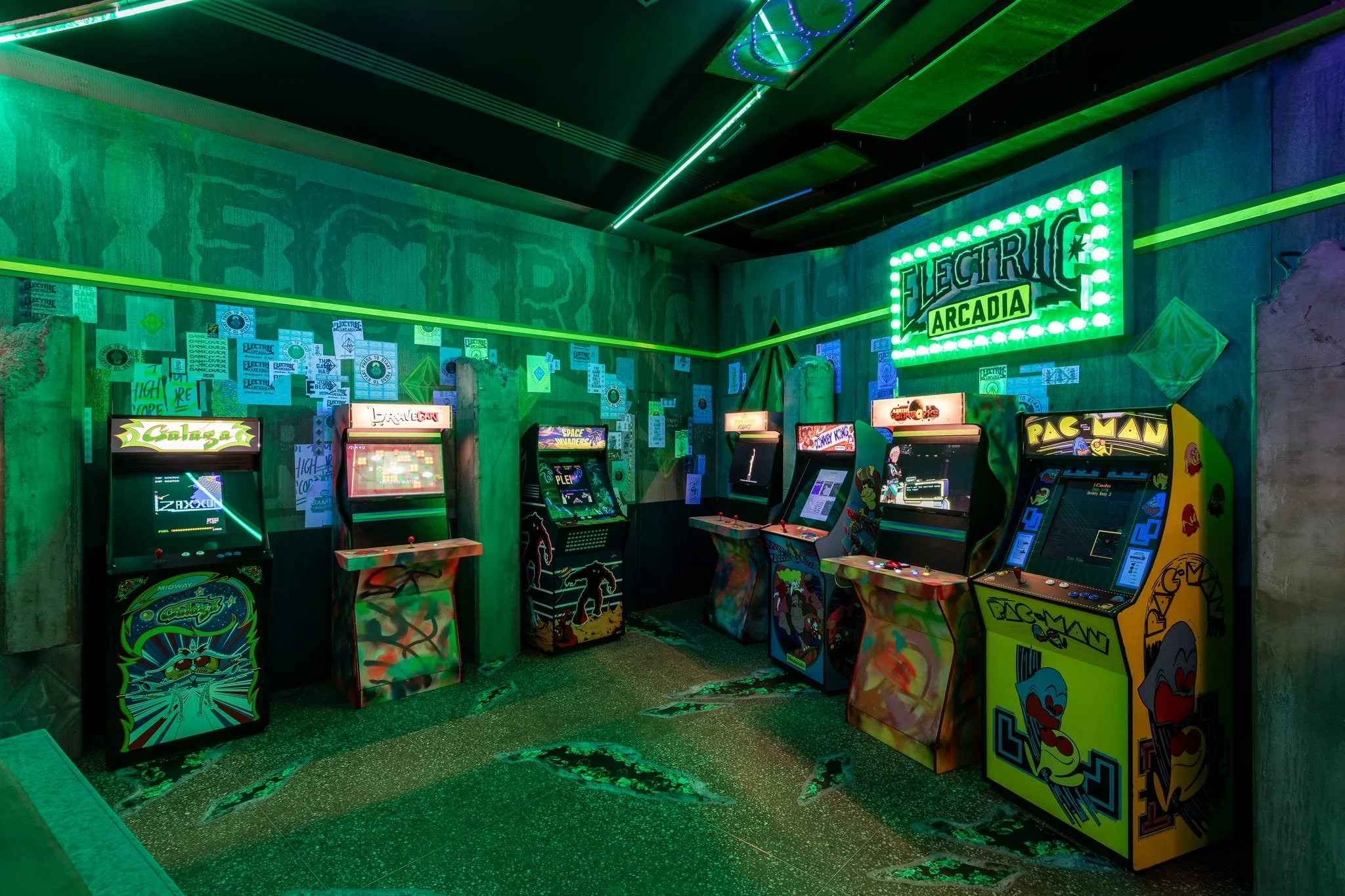 Hand made arcade cabinets with custom light boxes and controls being displayed at Federation Square Melbourne