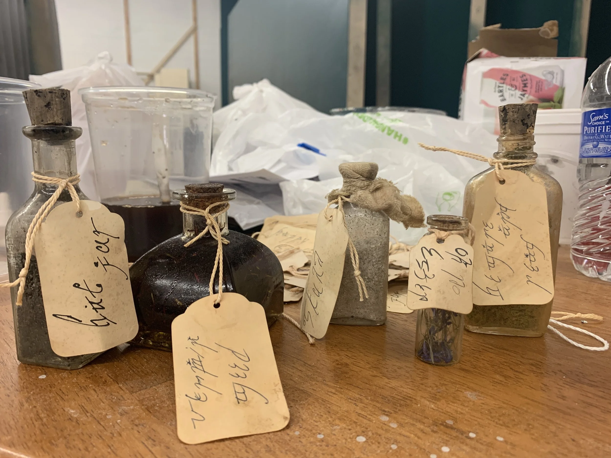 Elvish language prop bottles