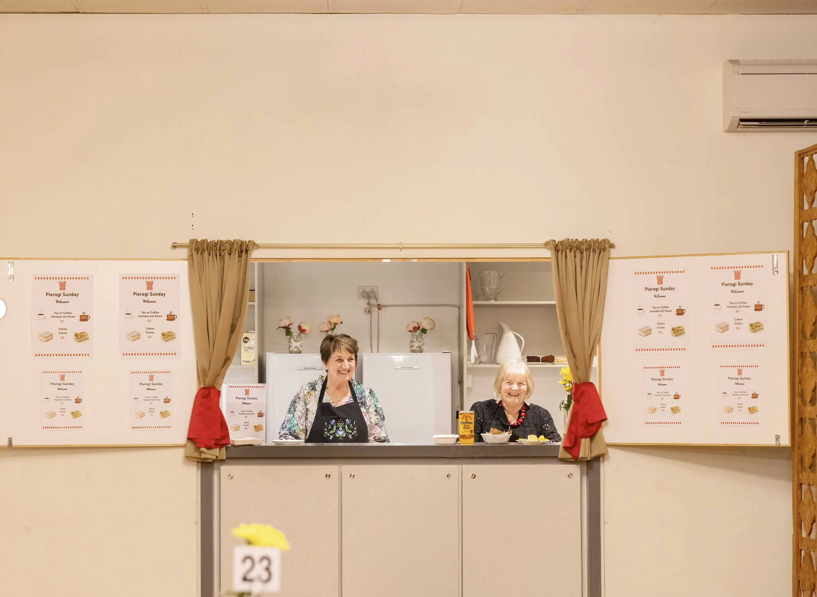 Smiling hosts behind the counter at Pierogi Sunday, Dom Polski Centre Adelaide.