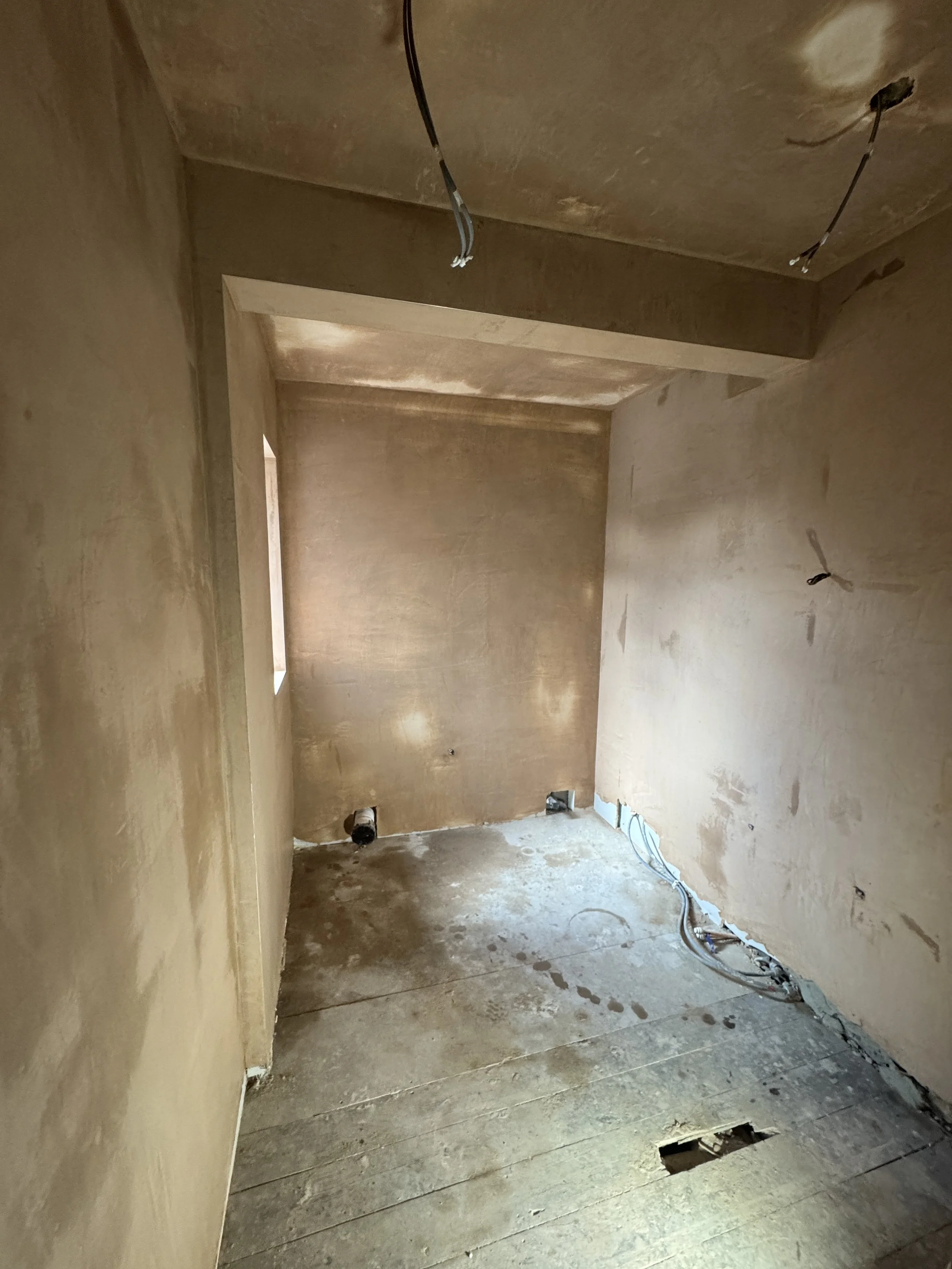 Bathroom plasterboarded with drywall and fully skimmed