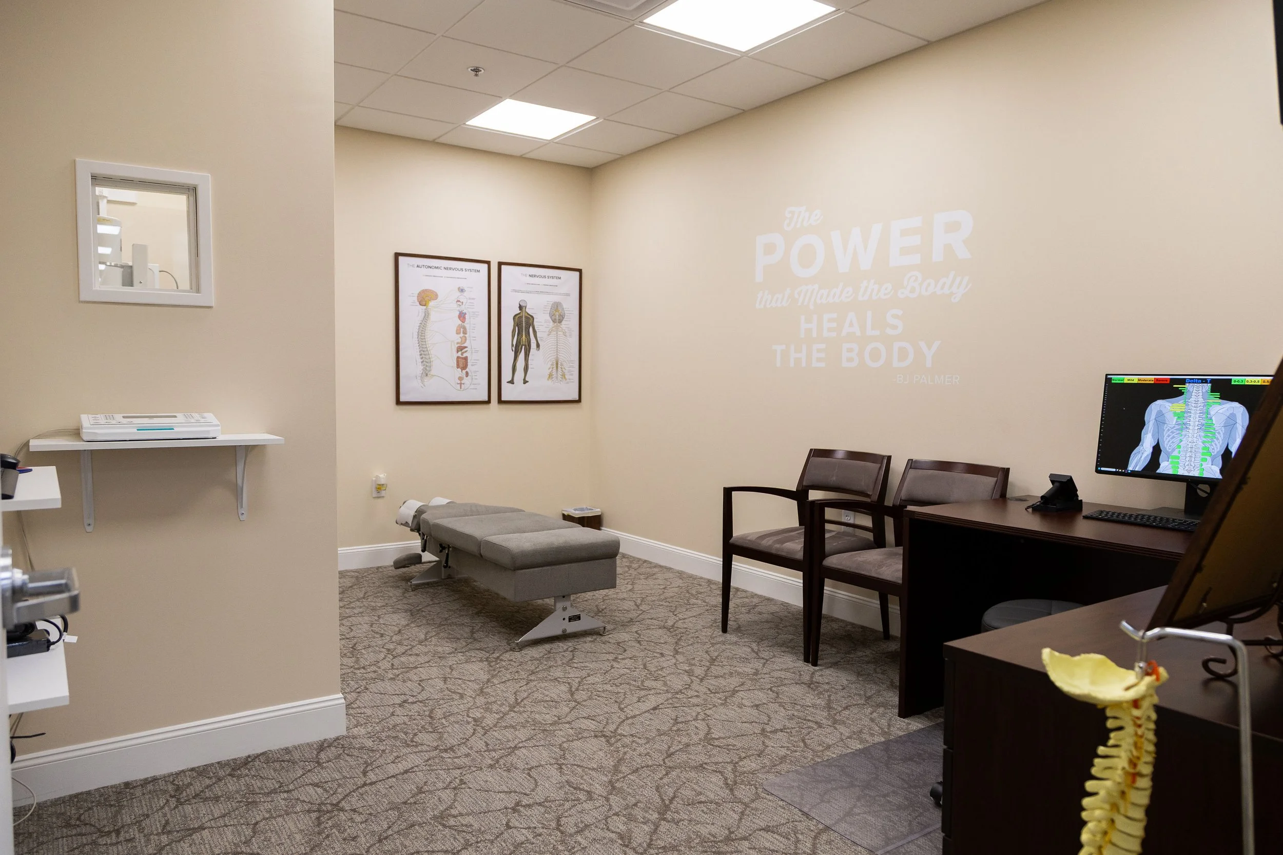 Private treatment room at Rouskas Family Chiropractic in Fairfield, NJ, featuring an adjustment table and a welcoming patient care environment.