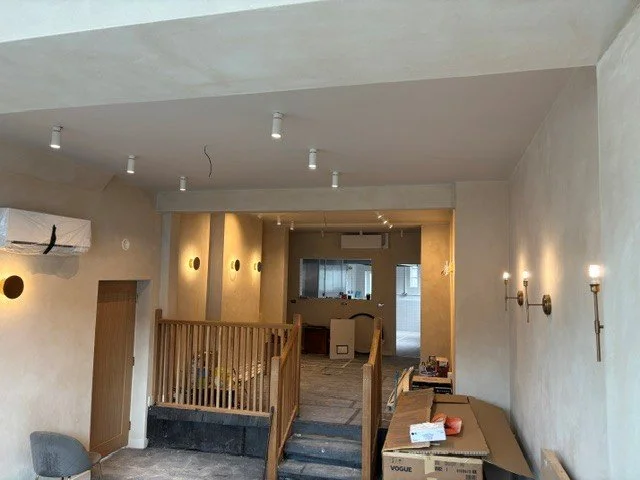 Interior Restaurant Margarets , Cambridge, under modern lighting fixtures.