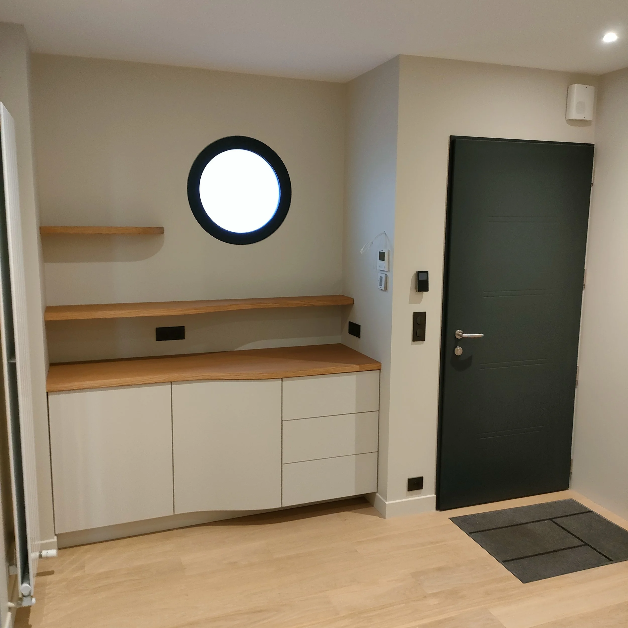 curved entryway furniture inside a niche. modern simple design