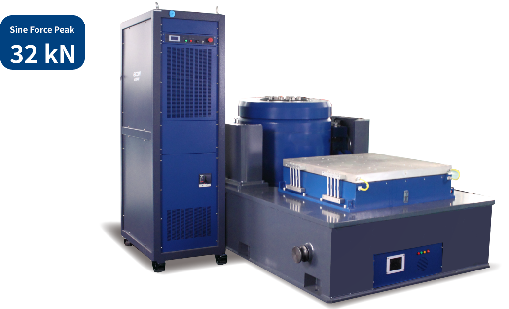 EDM-3200 32 kN electrodynamic vibration shaker system with tall power amplifier cabinet, blue shaker body, and large horizontal slip table for high-frequency multi-axis vibration testing