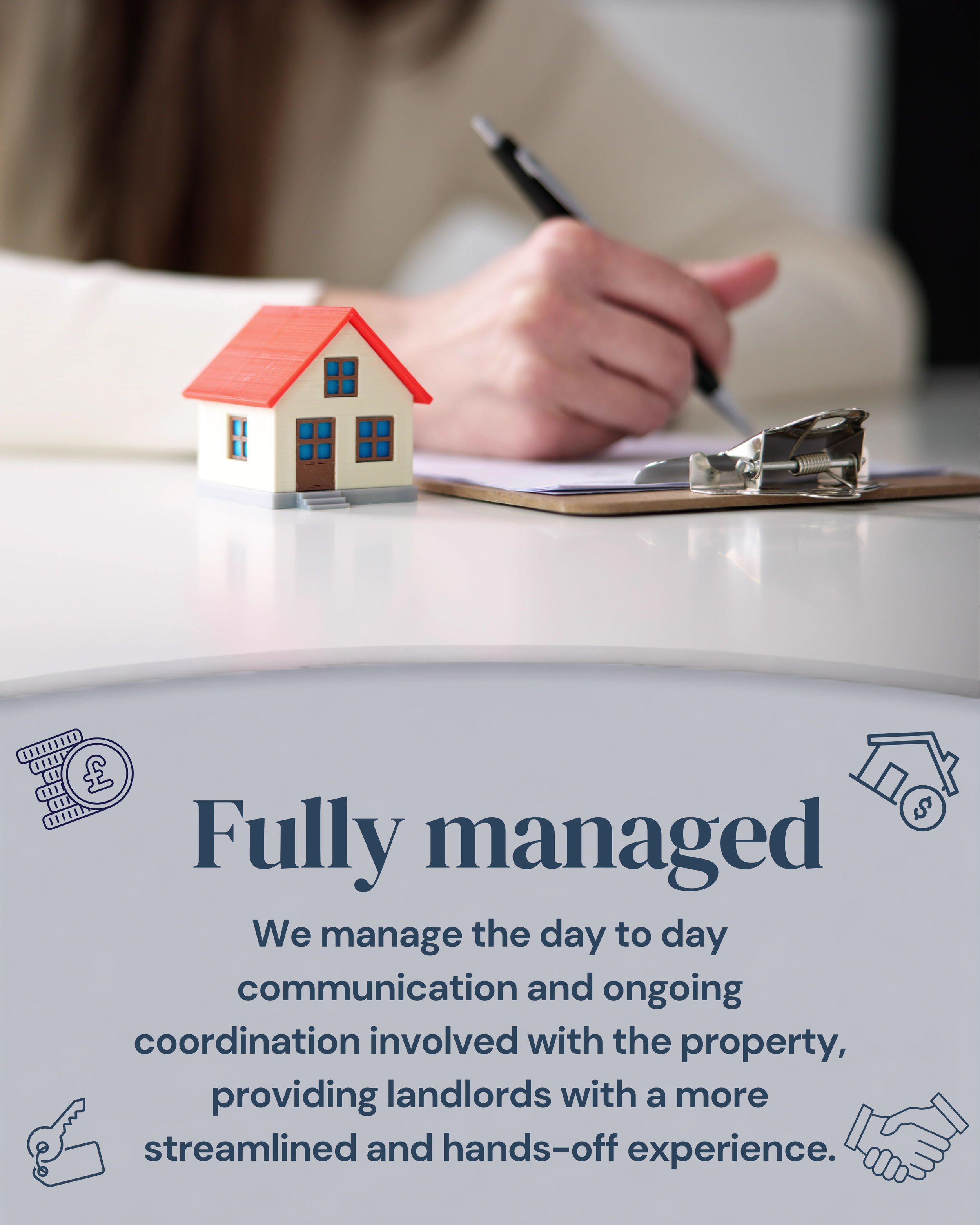 Close-up of a sign that reads "Fully managed" with additional text describing property management services. On the table in front of the sign, there is a small model house with a red roof and blue windows. There is a person in the background writing on a clipboard with a pen, and a stapler is also visible on the table.