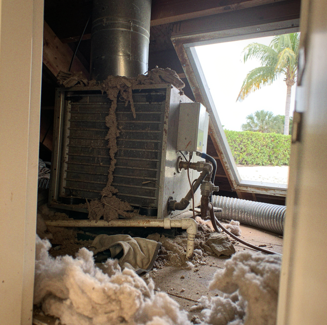 attic air handler with rodent nest debris