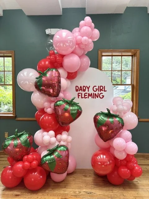 A beautiful backdrop and balloons for a "Berry Sweet" baby shower in Souderton PA