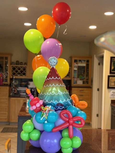 This is a dozen helium latex balloons and a balloon bouquet for a 65th birthday in Doylestown PA