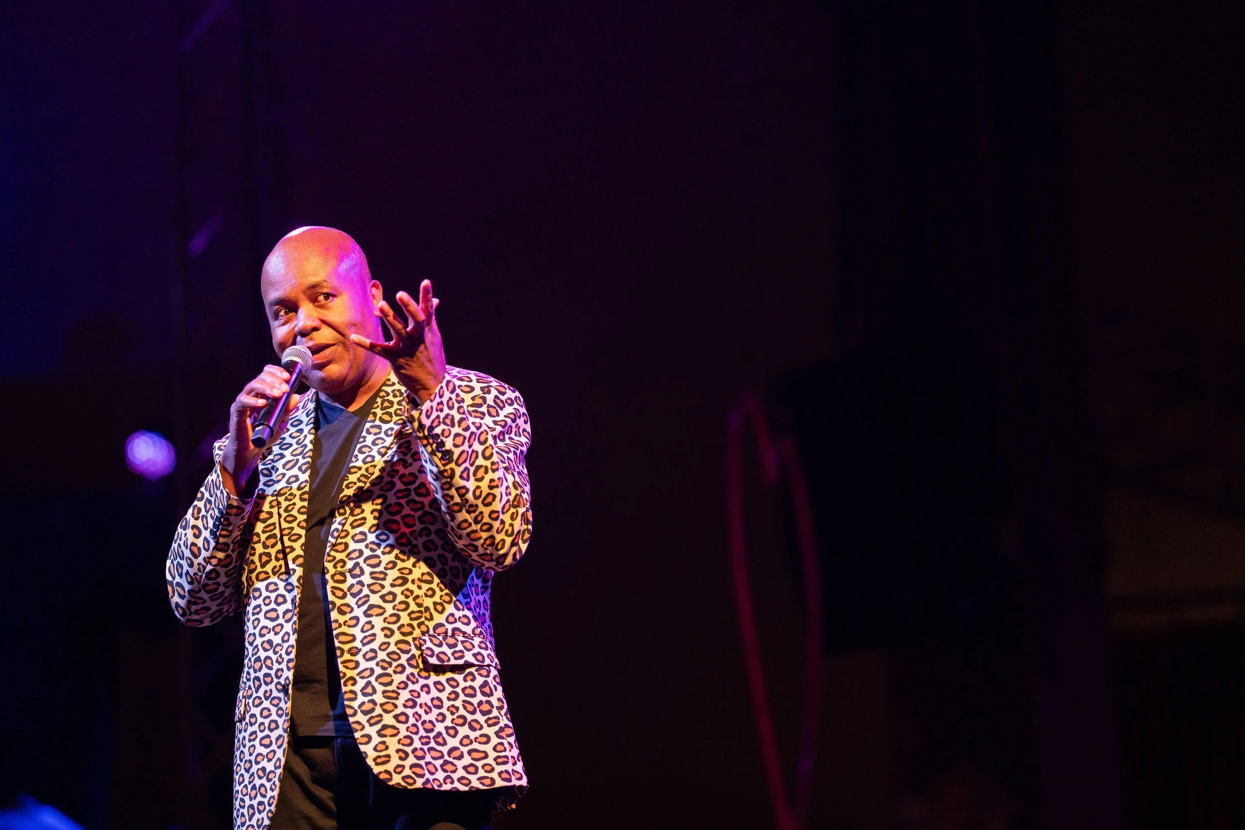 Image of Glynn Washington in leopard coat at 2024 Runway Stories Big Top