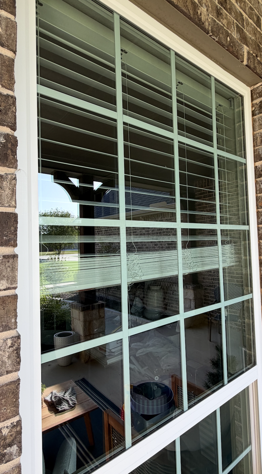 After cleaning top front office window it now has a nice, clear view of the front yard.