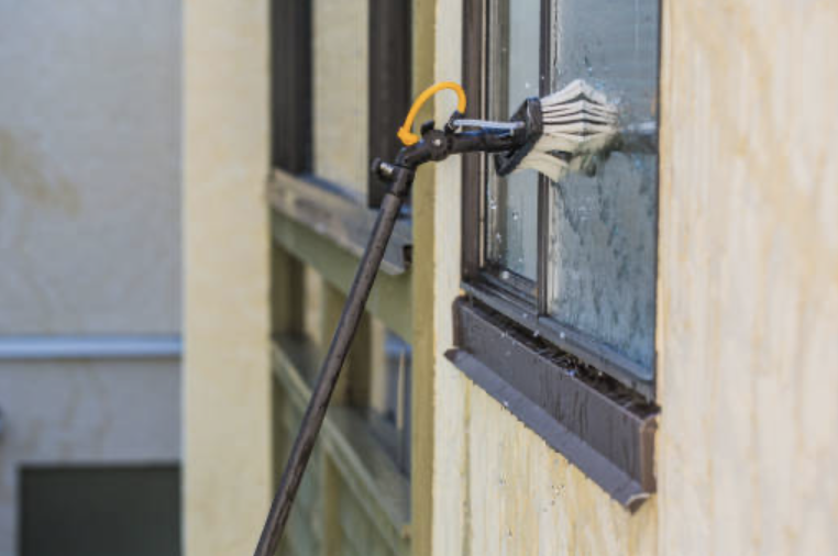 Exterior home windows being refreshed during seasonal window cleaning