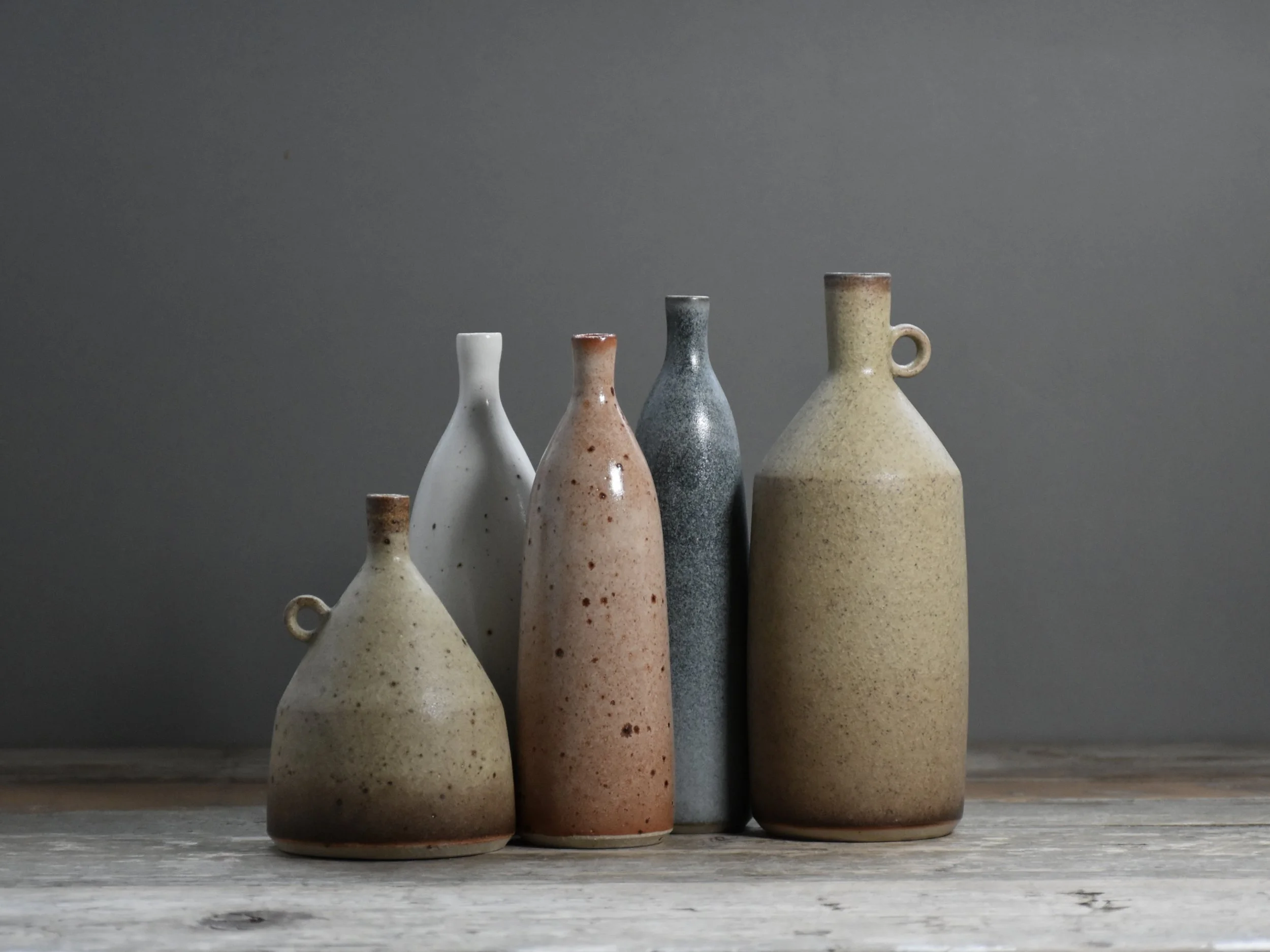 AW - A Gathering of Stoneware Bottles