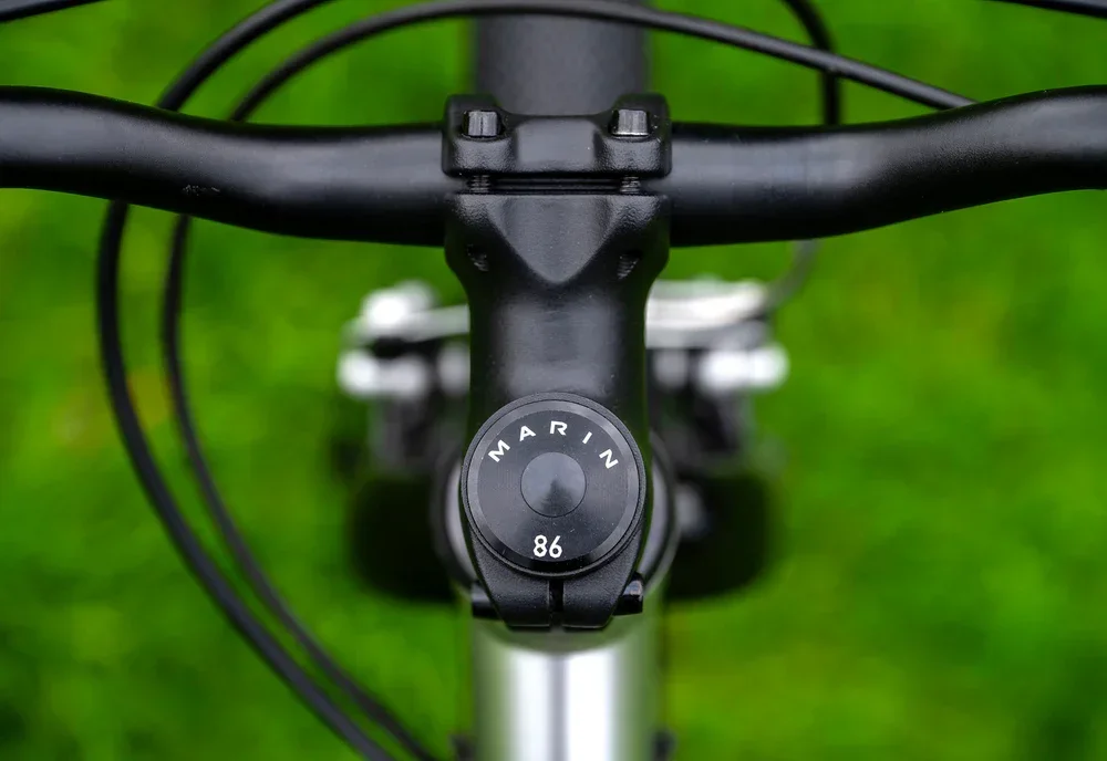 2025_MARIN_BIKES_COAST_TRAIL_TOP_CAP+%281%29.webp