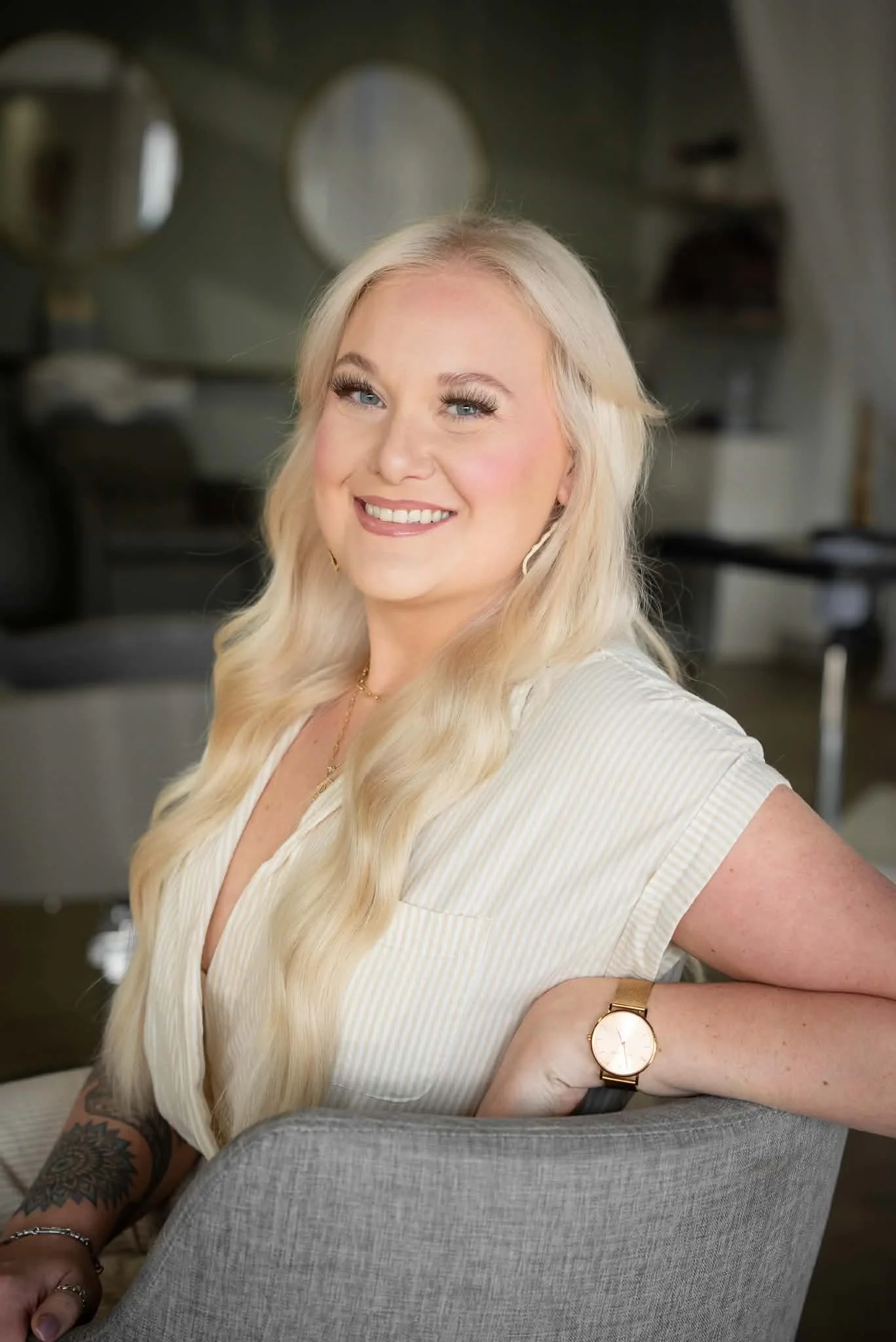 stylist using The Last Bead Method™- an innovative hair extension installation technique designed to help stylists create cleaner, more precise, secure, and seamless luxury extension installations.