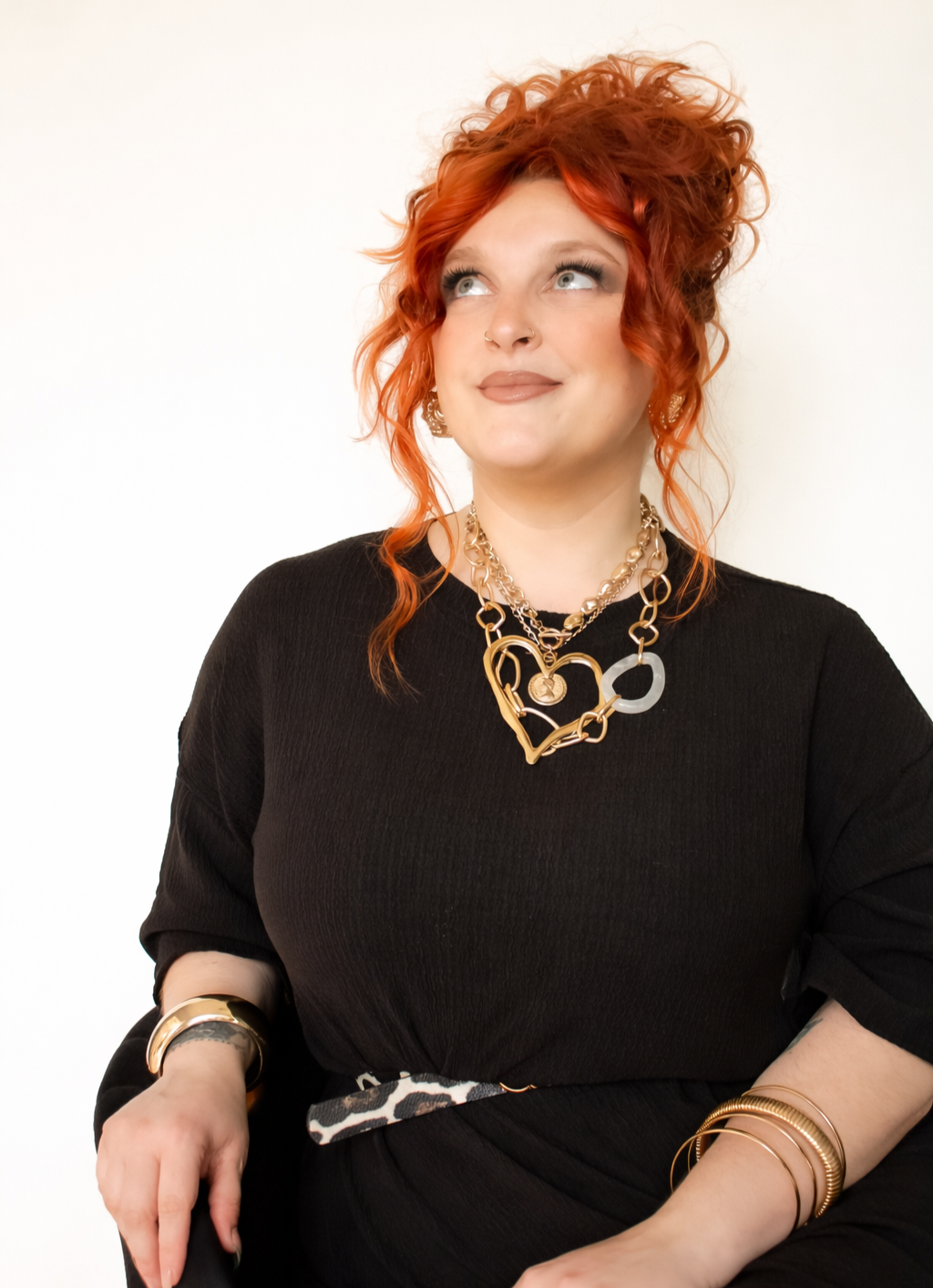 stylist using The Last Bead Method™- an innovative hair extension installation technique designed to help stylists create cleaner, more precise, secure, and seamless luxury extension installations.