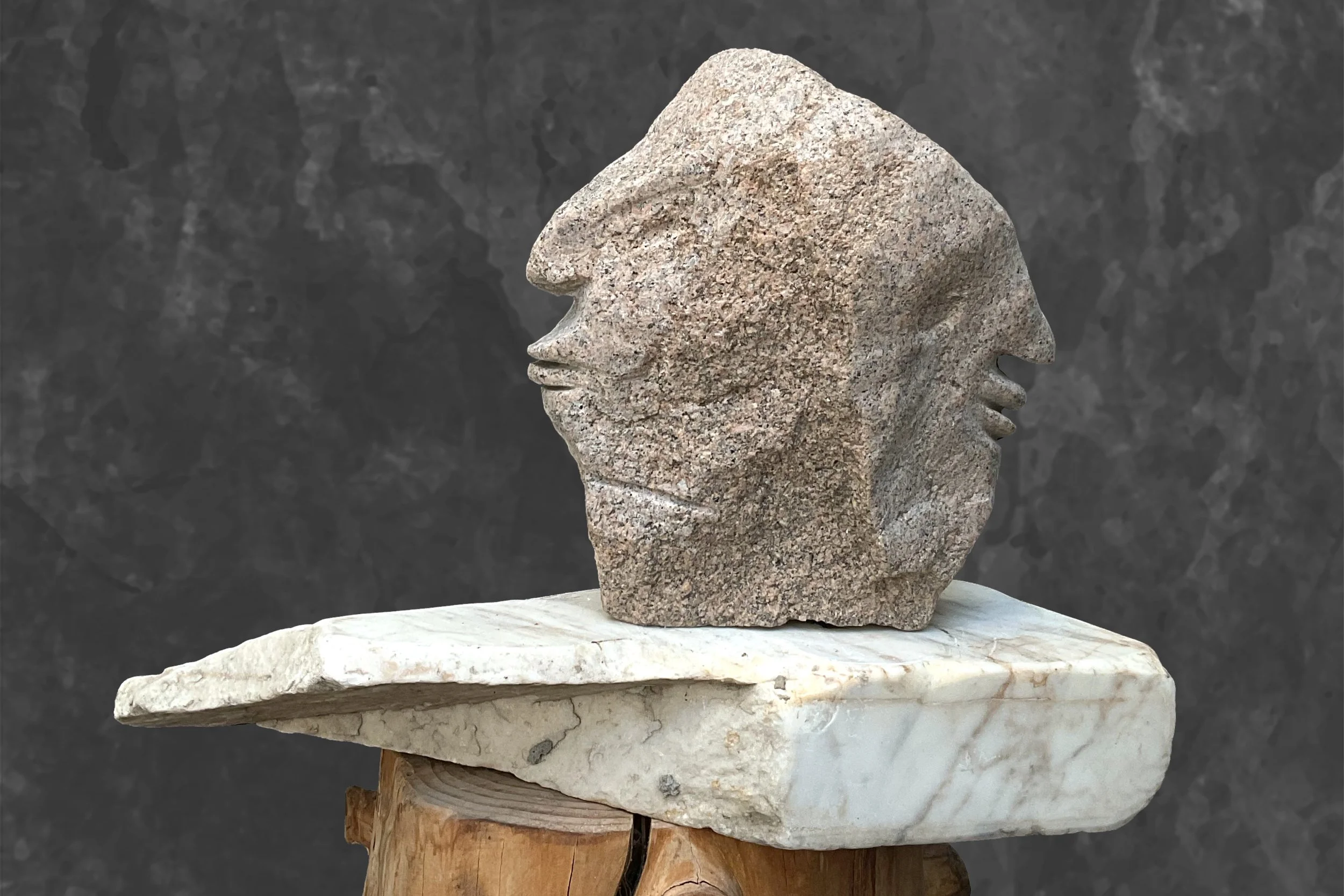 Kopf 09 // Janus-Kopf, H 32 x B 24 x T 45 cm, Bretonischer Granit auf Marmor