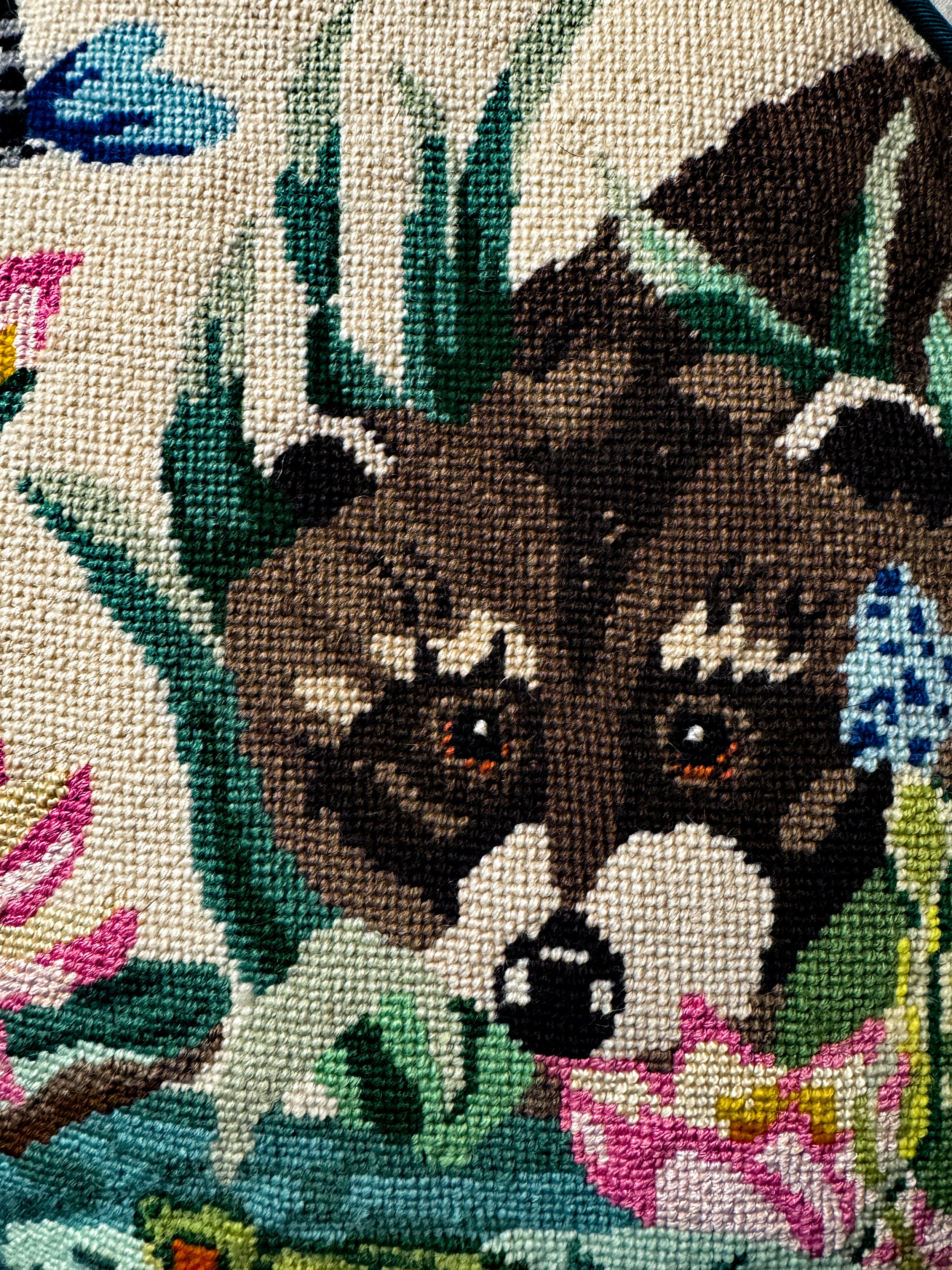 Vintage raccoon needlepoint pillow