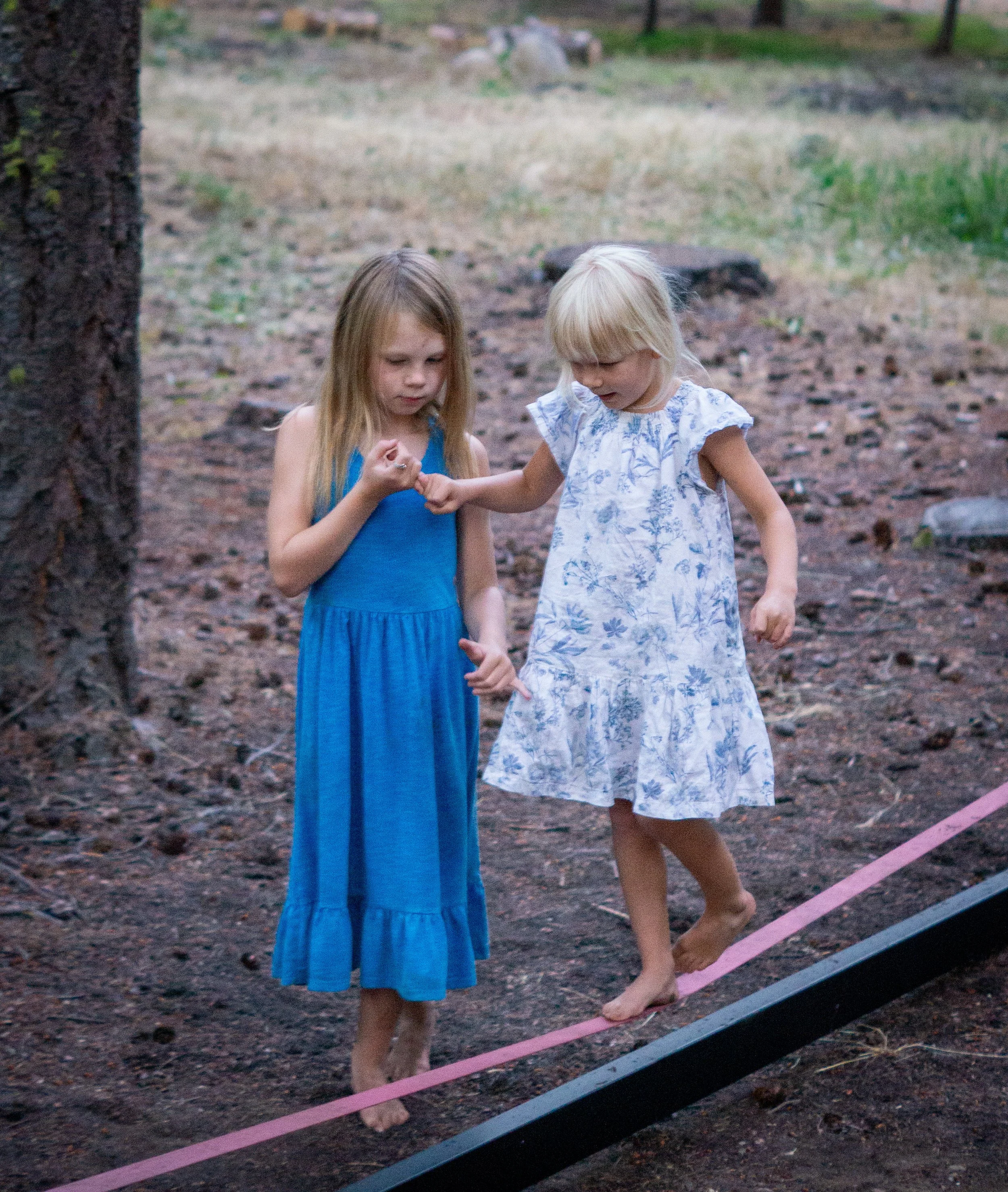 Children walking on slackline