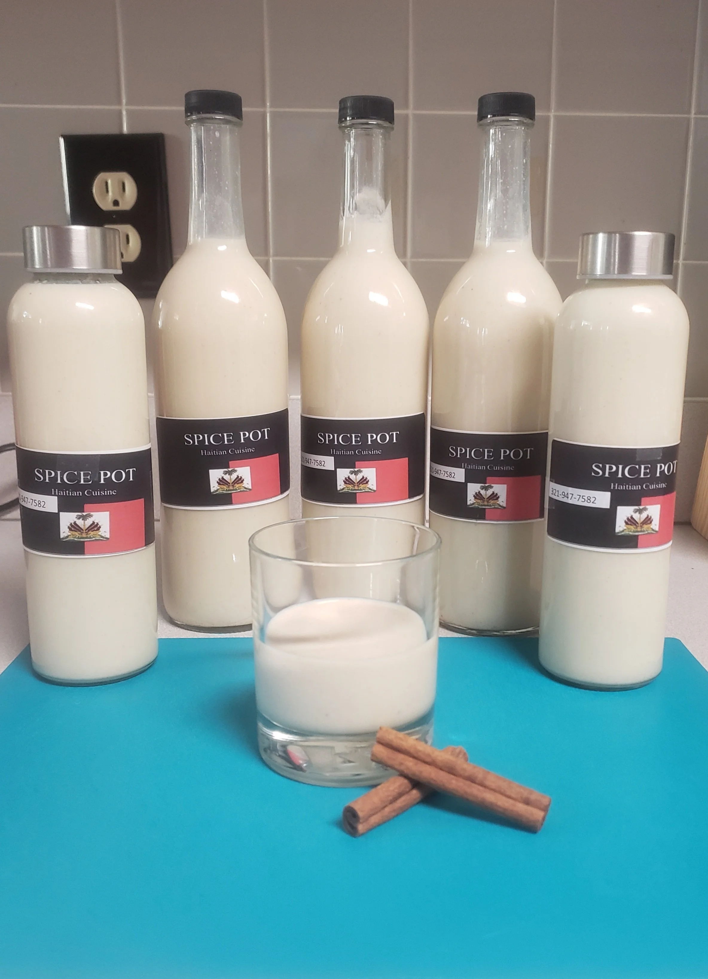 Glass Haitian Cremas (Haitian Rum Cream) (Spanish Coquito)