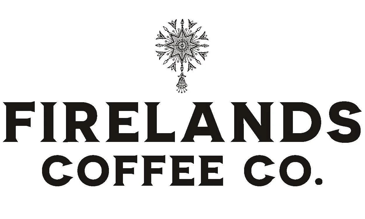 Logo for Firelands Coffee Co. featuring a decorative snowflake or star design above the company name in bold black letters.