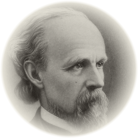 Black and white portrait of a man with a beard and mustache, with hair swept back, looking towards the right.