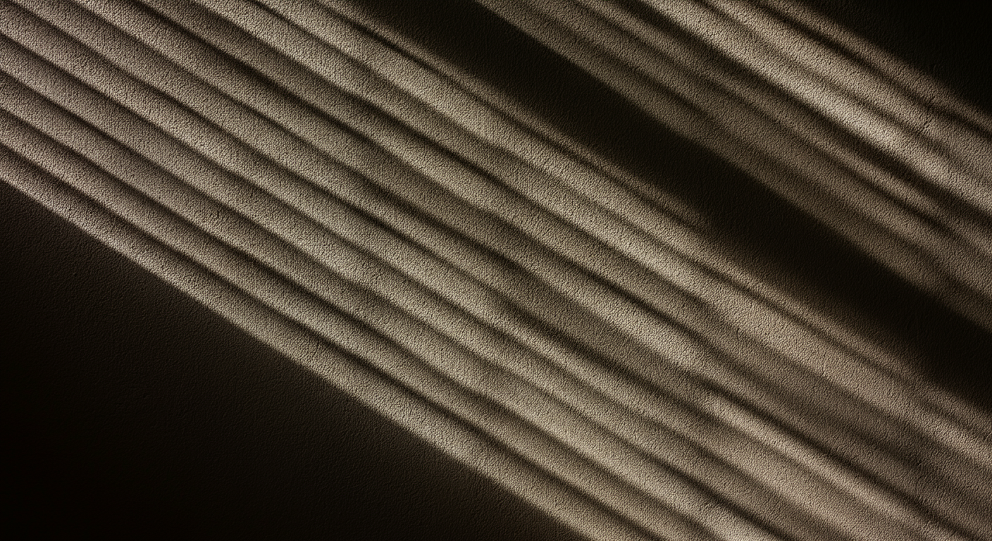 shadow lines against grey wall