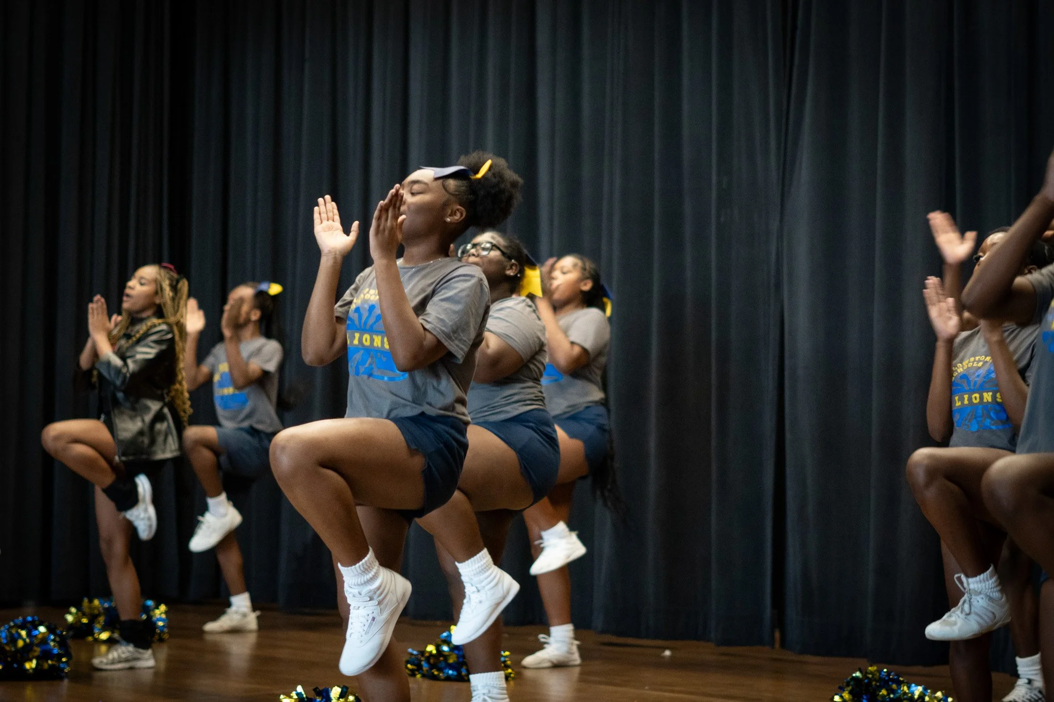 Cheer team on stage