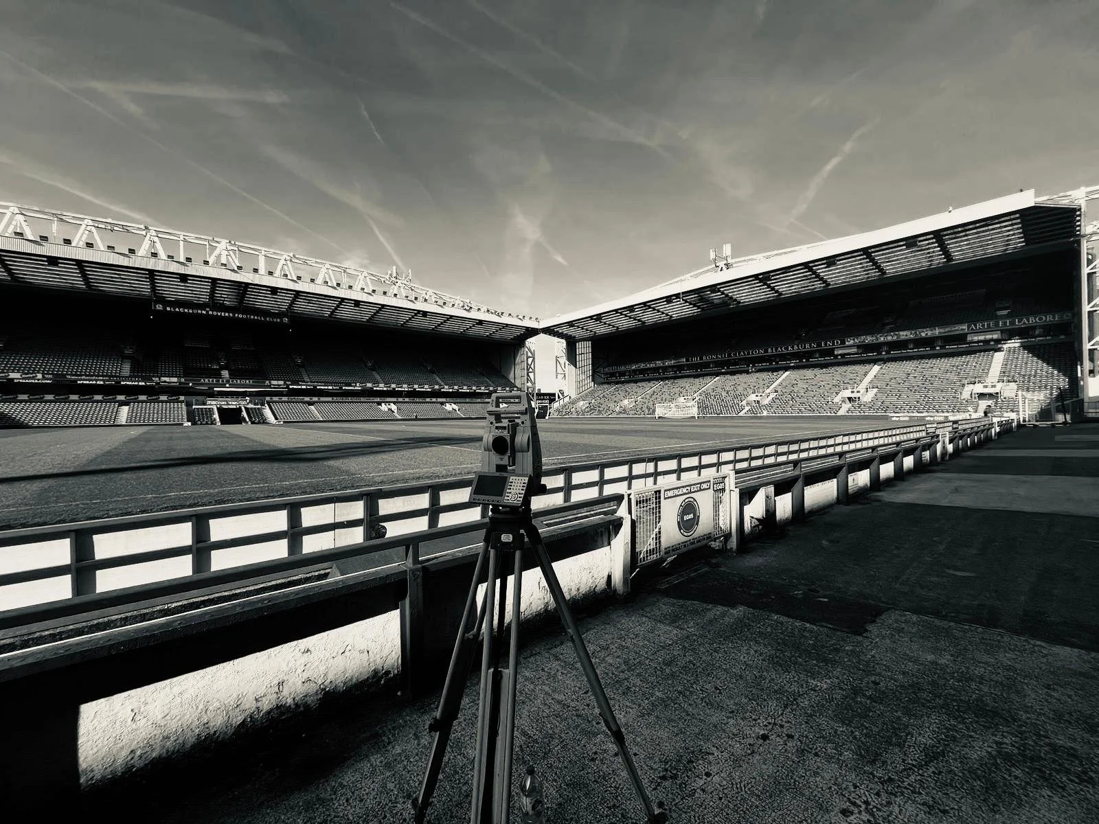 Surveyor using modern equipment to complete a topographic survey