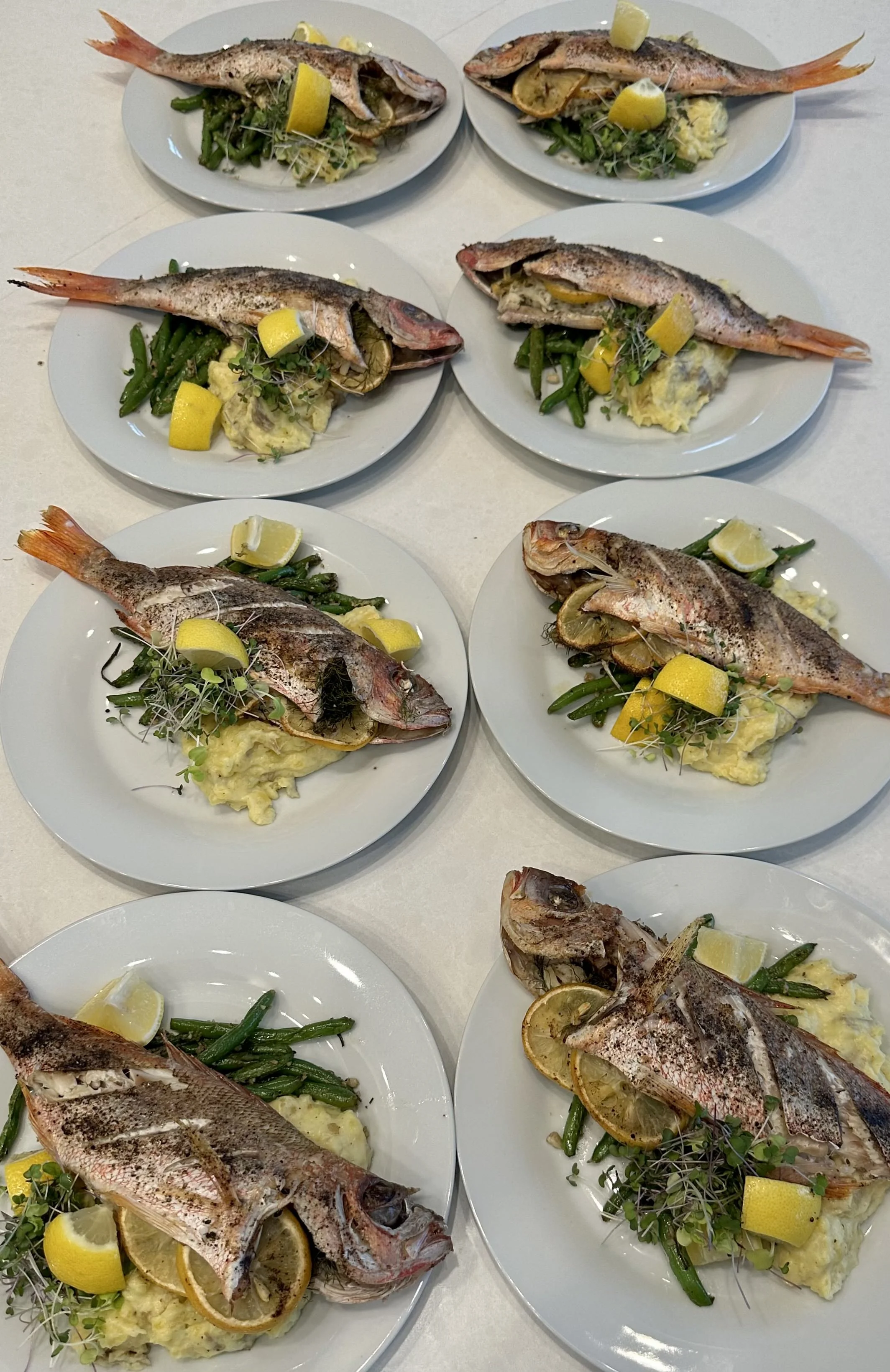 Whole Roasted Sea Bass Stuffed with Crab, Lemon, and Dill, with Yukon Gold Mash and Sautéed Green Beans