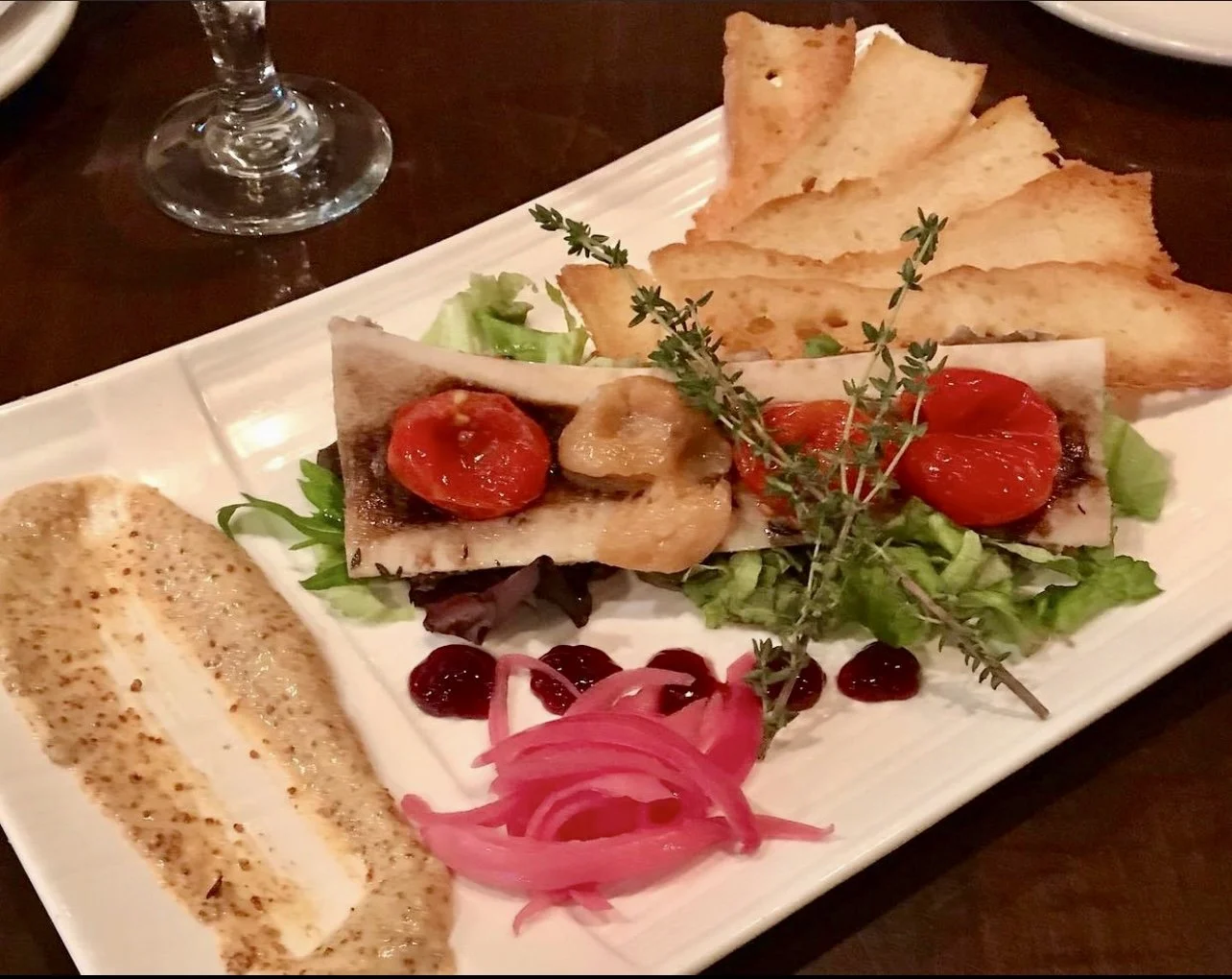 Roasted Marrow Bone, Confit Tomato and Garlic, Stone Ground Mustard, Pickled Onion, Raspberry Jam, Toast Points
