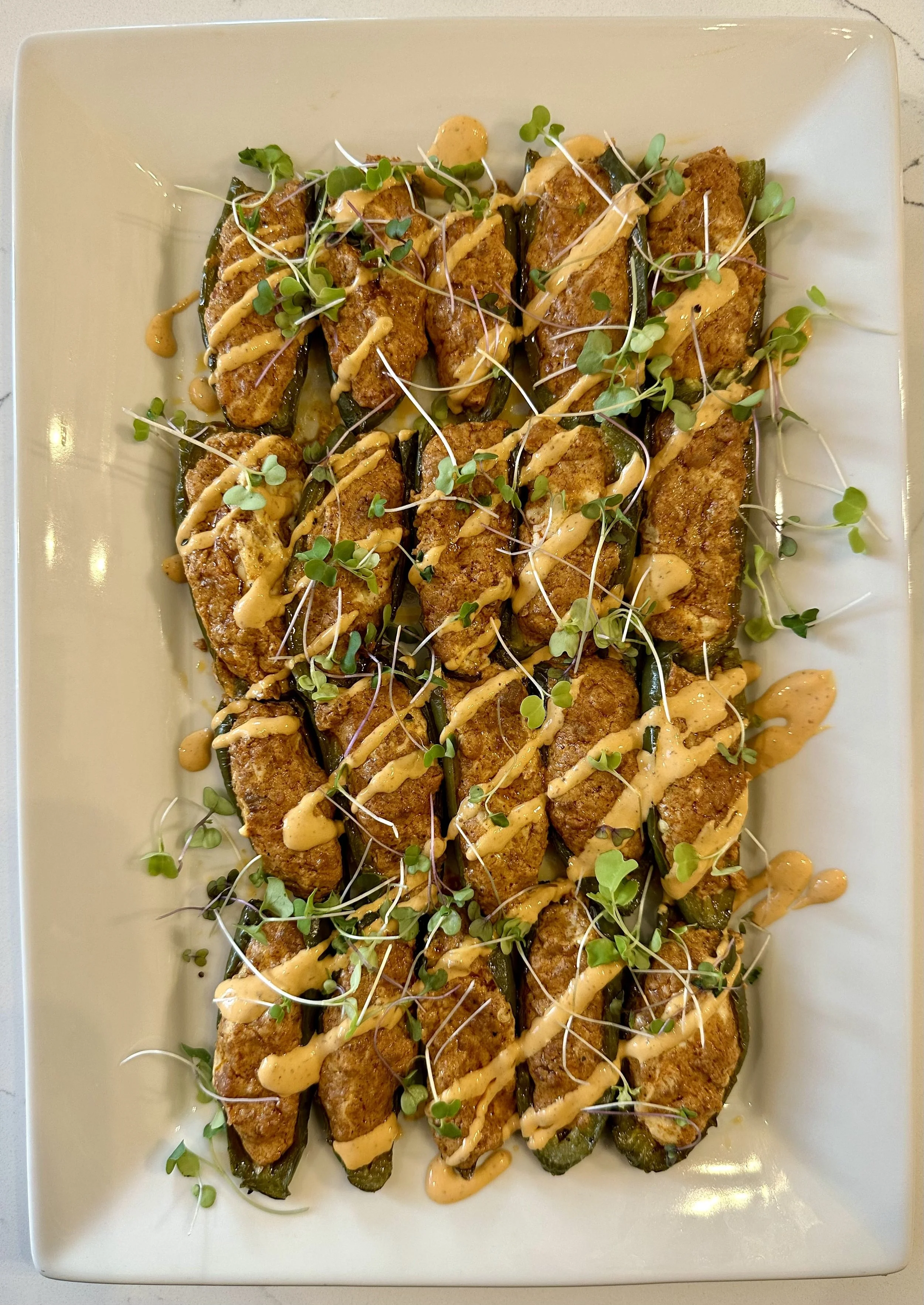 Roasted Jalapeño, Chorizo-Cream Cheese Filling with Fresh herbs and Roasted Garlic, Chipotle Crema