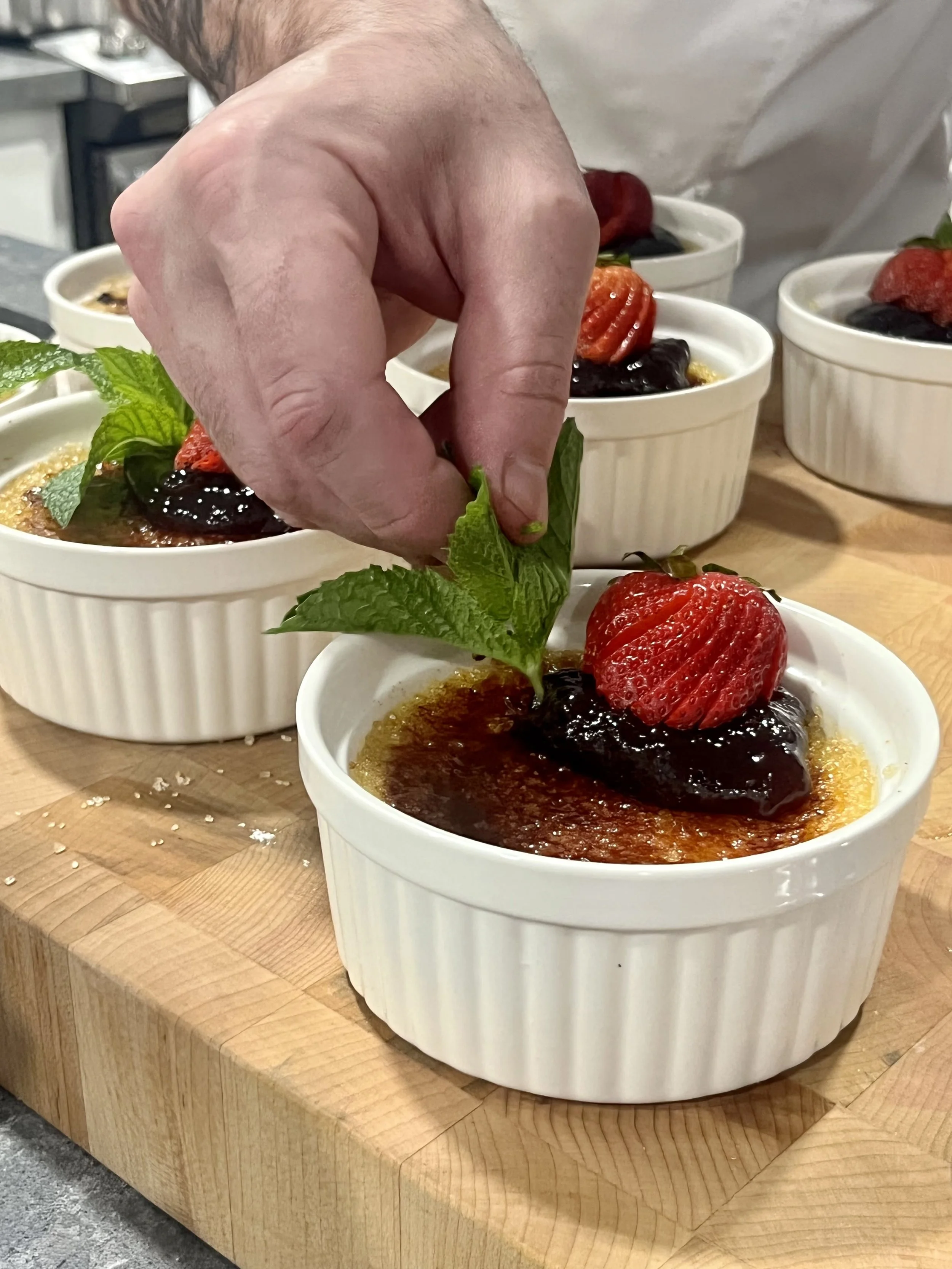 Vanilla Creme Brulee, Turbinado Sugar, Homemade Fig Preserves, Fresh Strawberry and Mint
