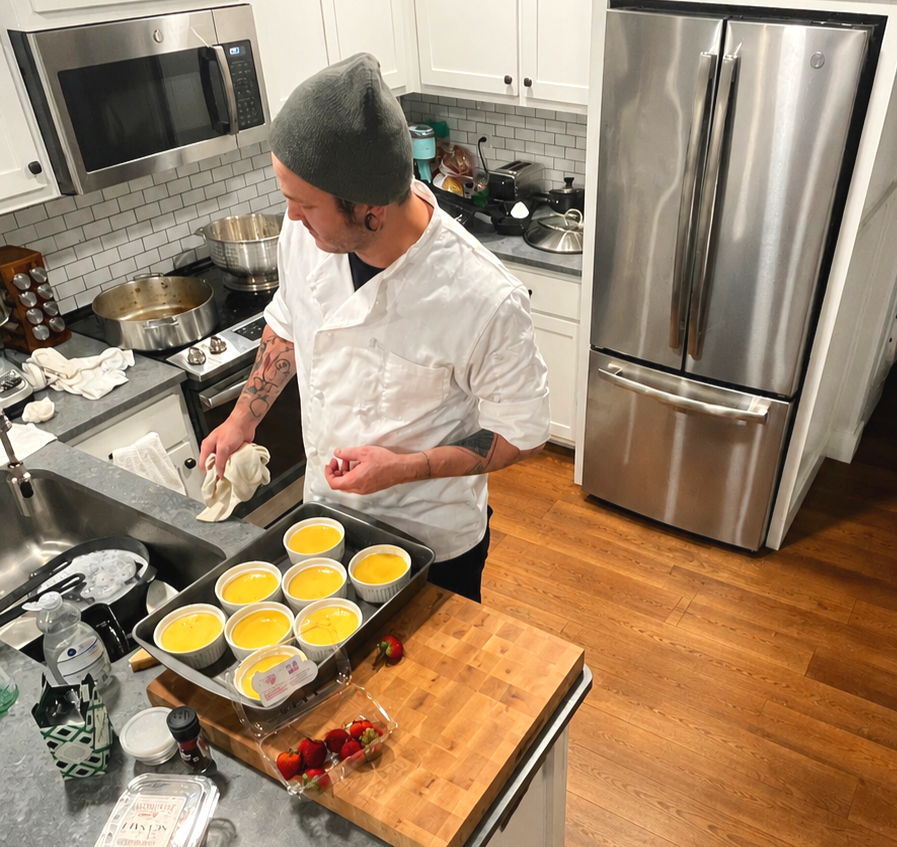 Chef Devin preparing crème brûlée.