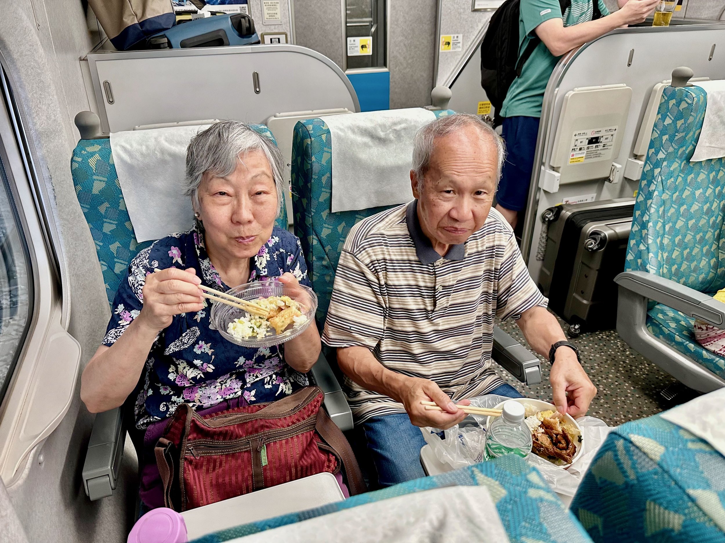 Mom and Dad on the bullet train back to Taipei