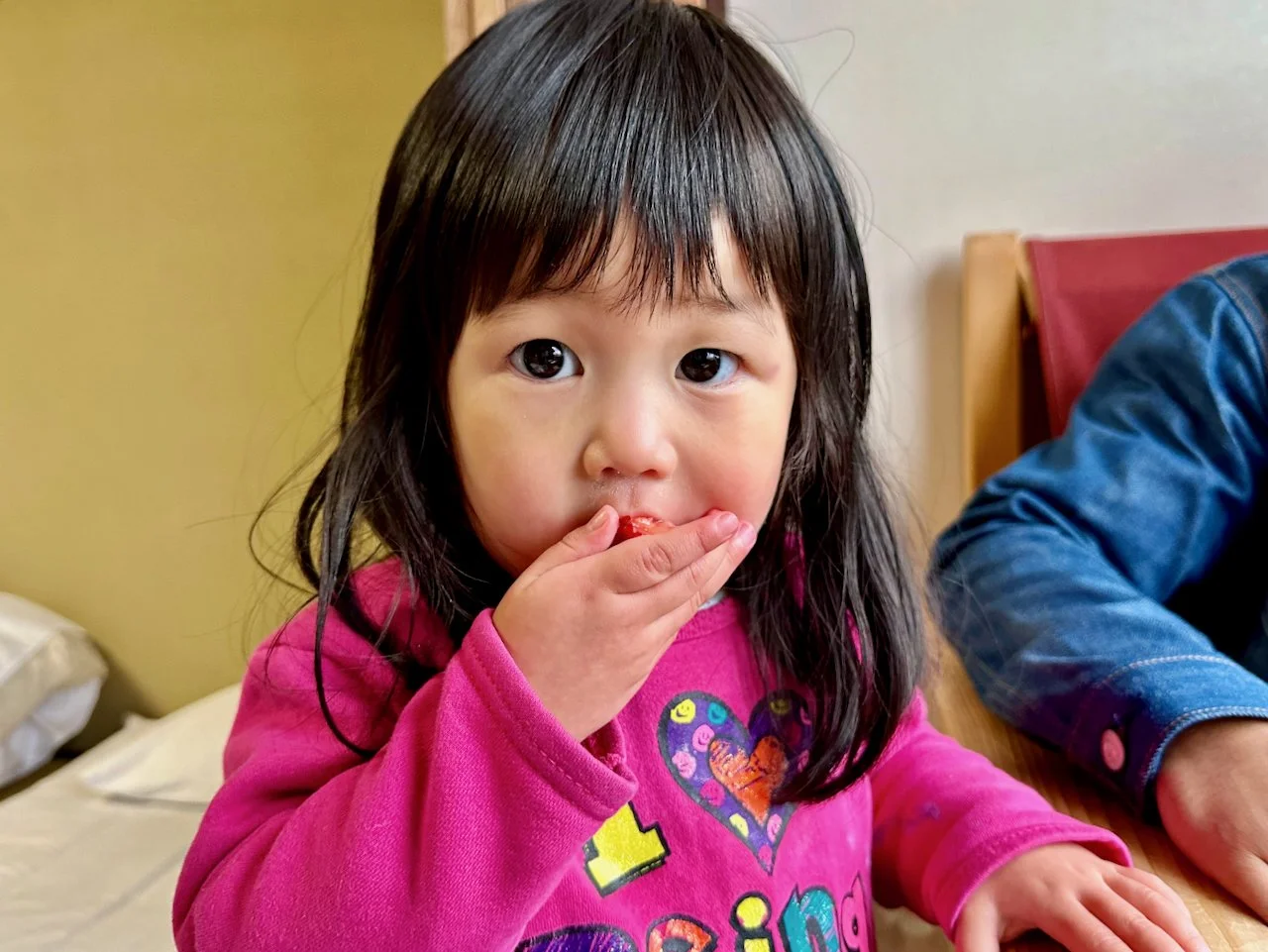Zia trying strawberries in Nara