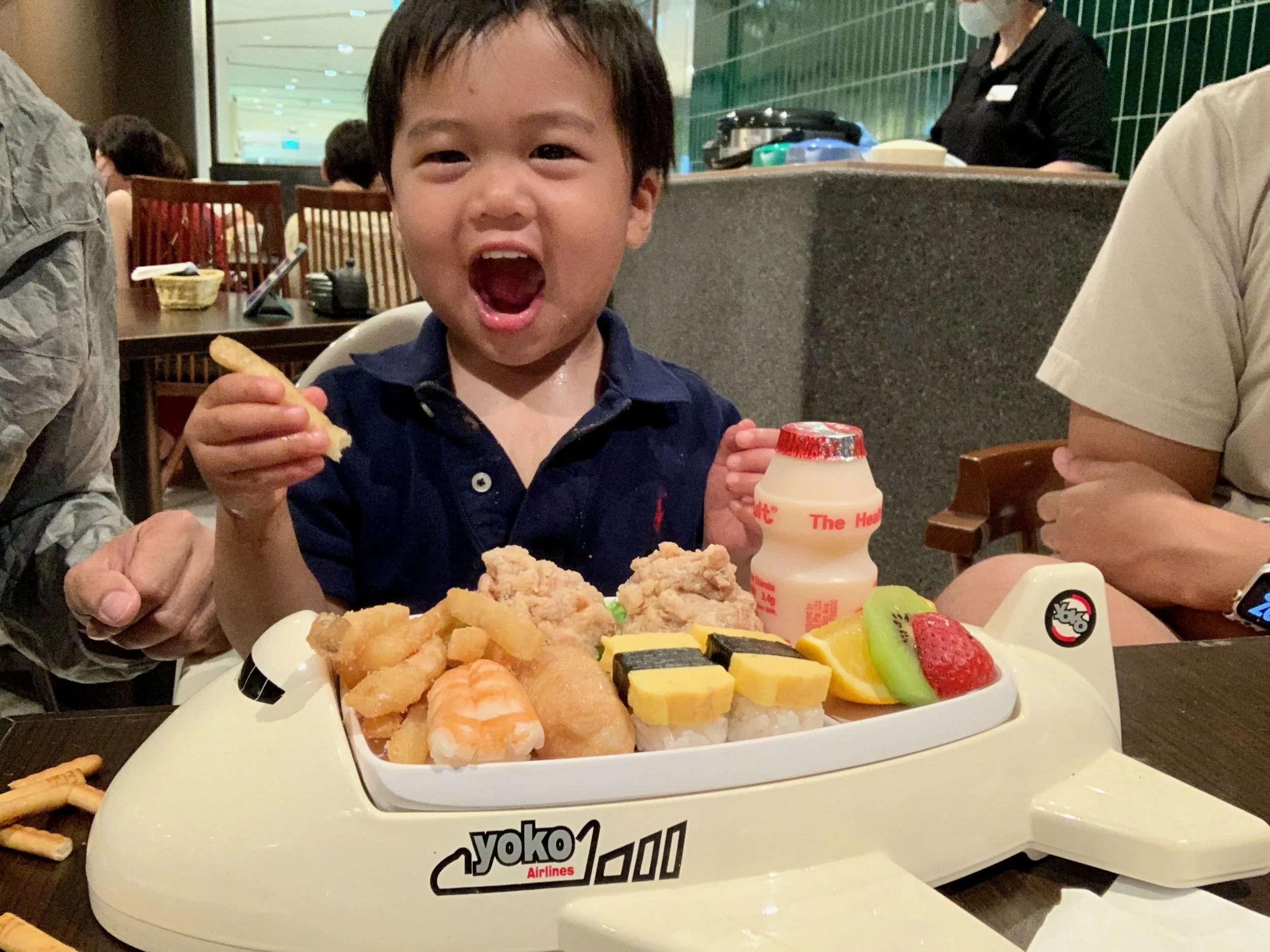 Ethan excited to get his first kid's meal