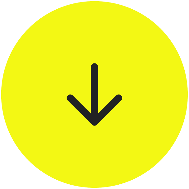 Yellow circular sign with a black downward arrow symbol in the center