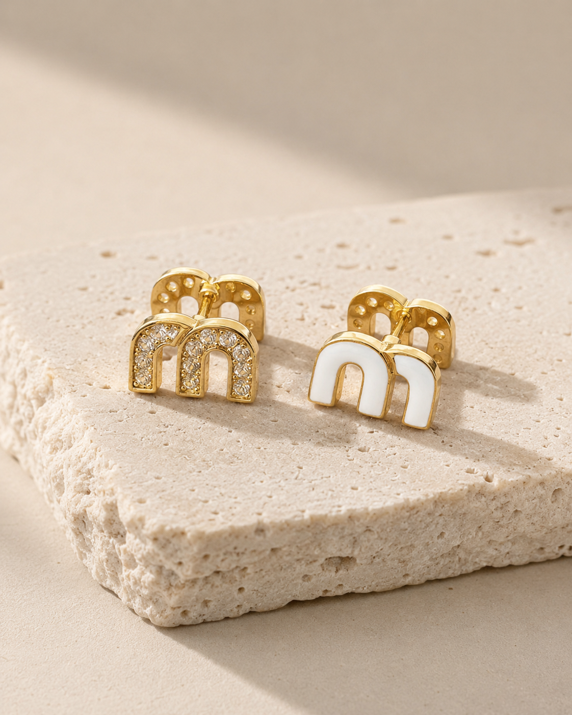 M Huggie Earrings.png