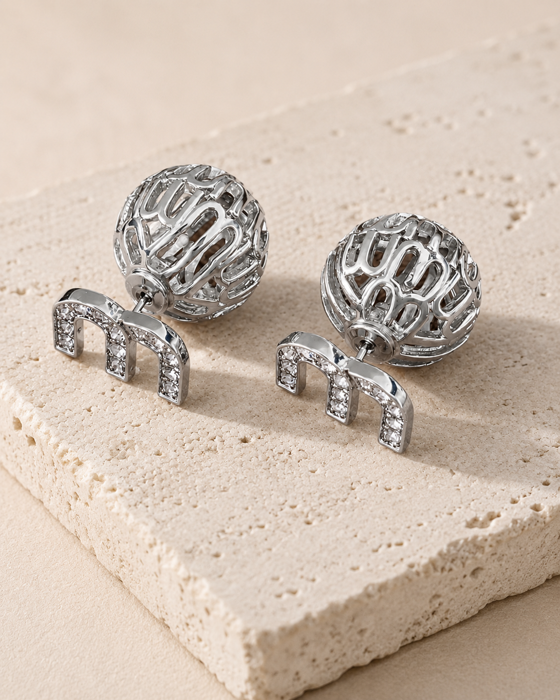 M Hallow Ball Stud Earrings.png