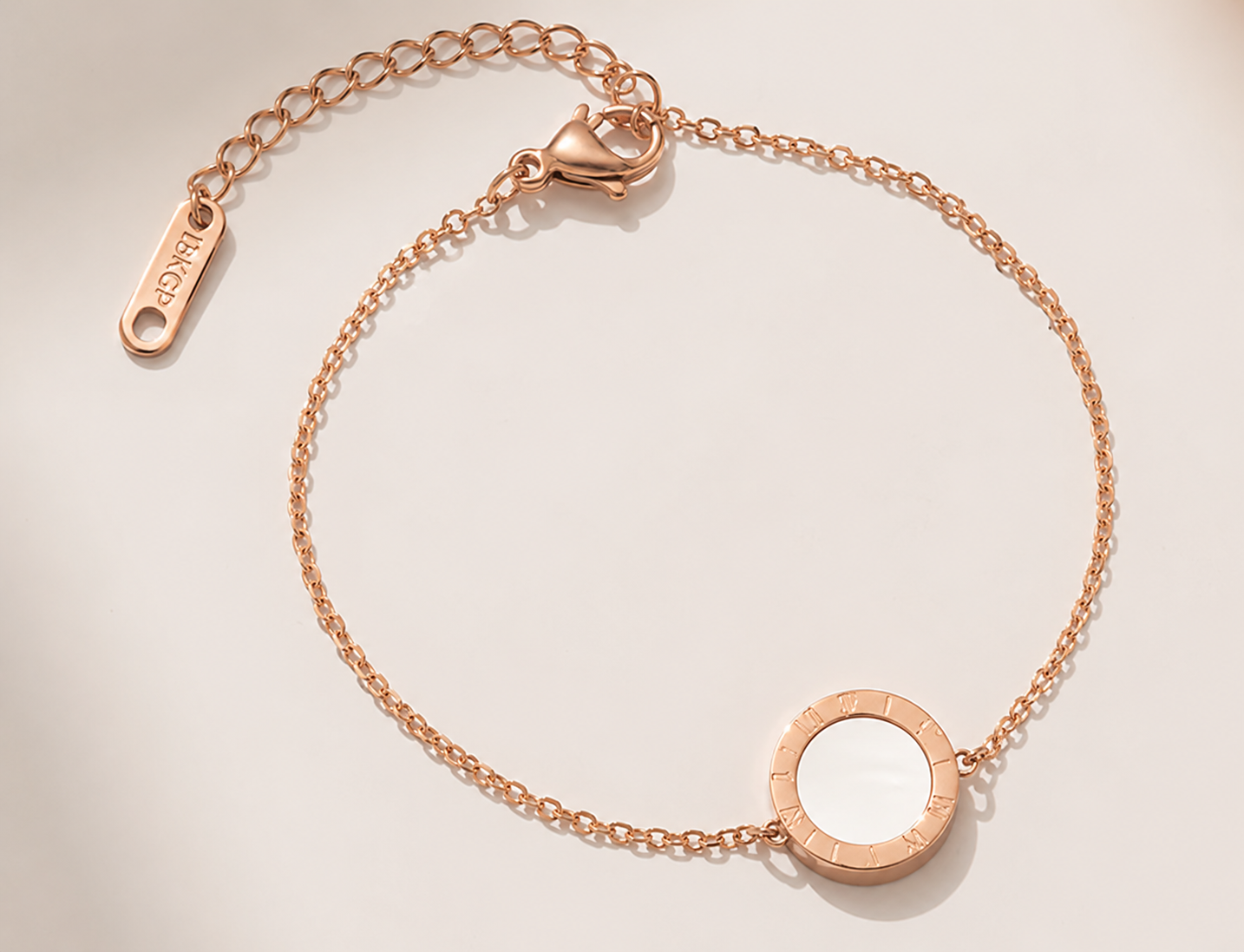 white side Gold Roman Numeral Pendant Bracelet.png