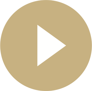 A beige circular play button with a white triangle in the center indicating play.