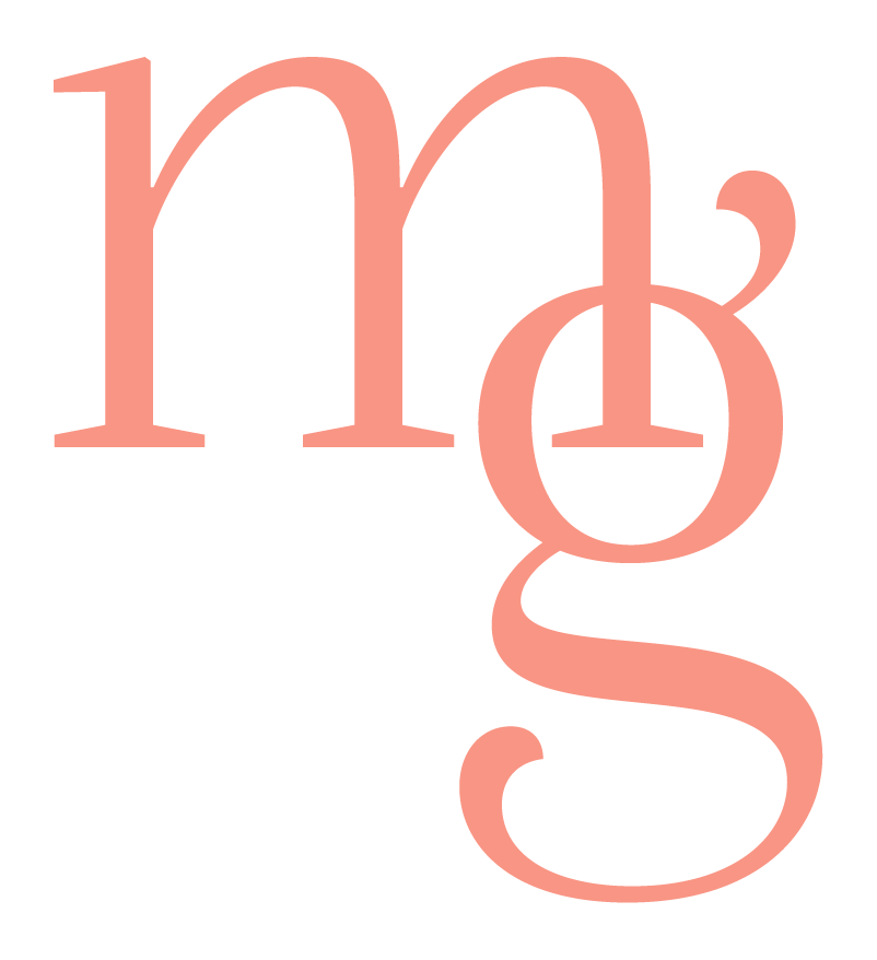 Close-up of a pink monogram letter 'm' and a lowercase 'g' intertwined on a black background