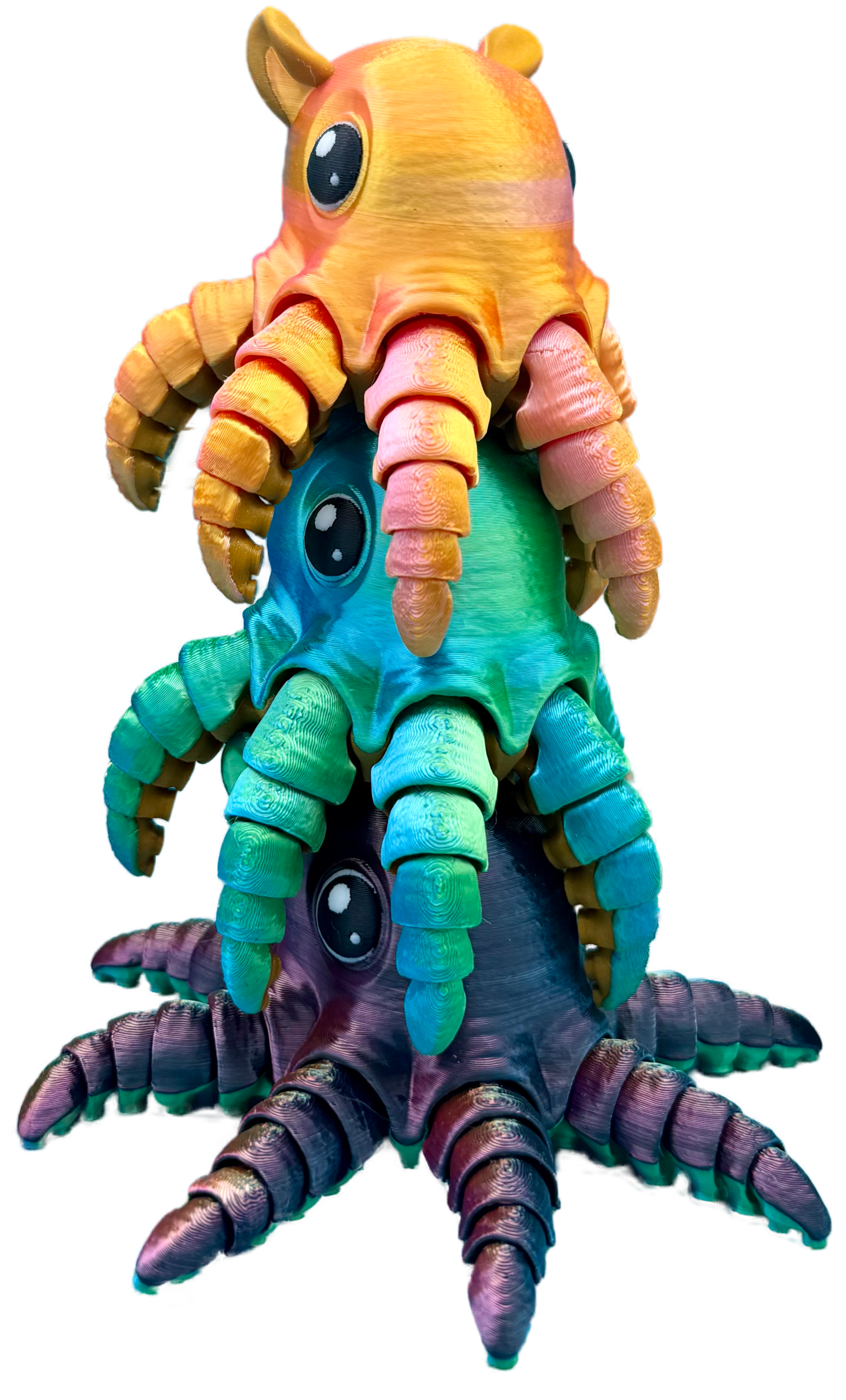 Bunte, cartoonartige Kreatur mit Oktopus-ähnlichem Körper, großen Augen und leuchtenden Farben, auf spiegelndem schwarzen Hintergrund.