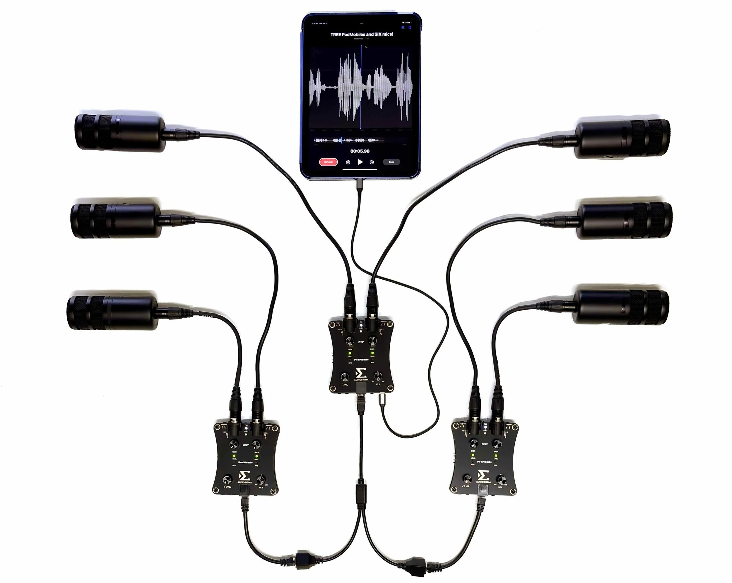 A smartphone connected to audio equipment with multiple microphones and audio controllers, displaying a waveform and audio editing interface.