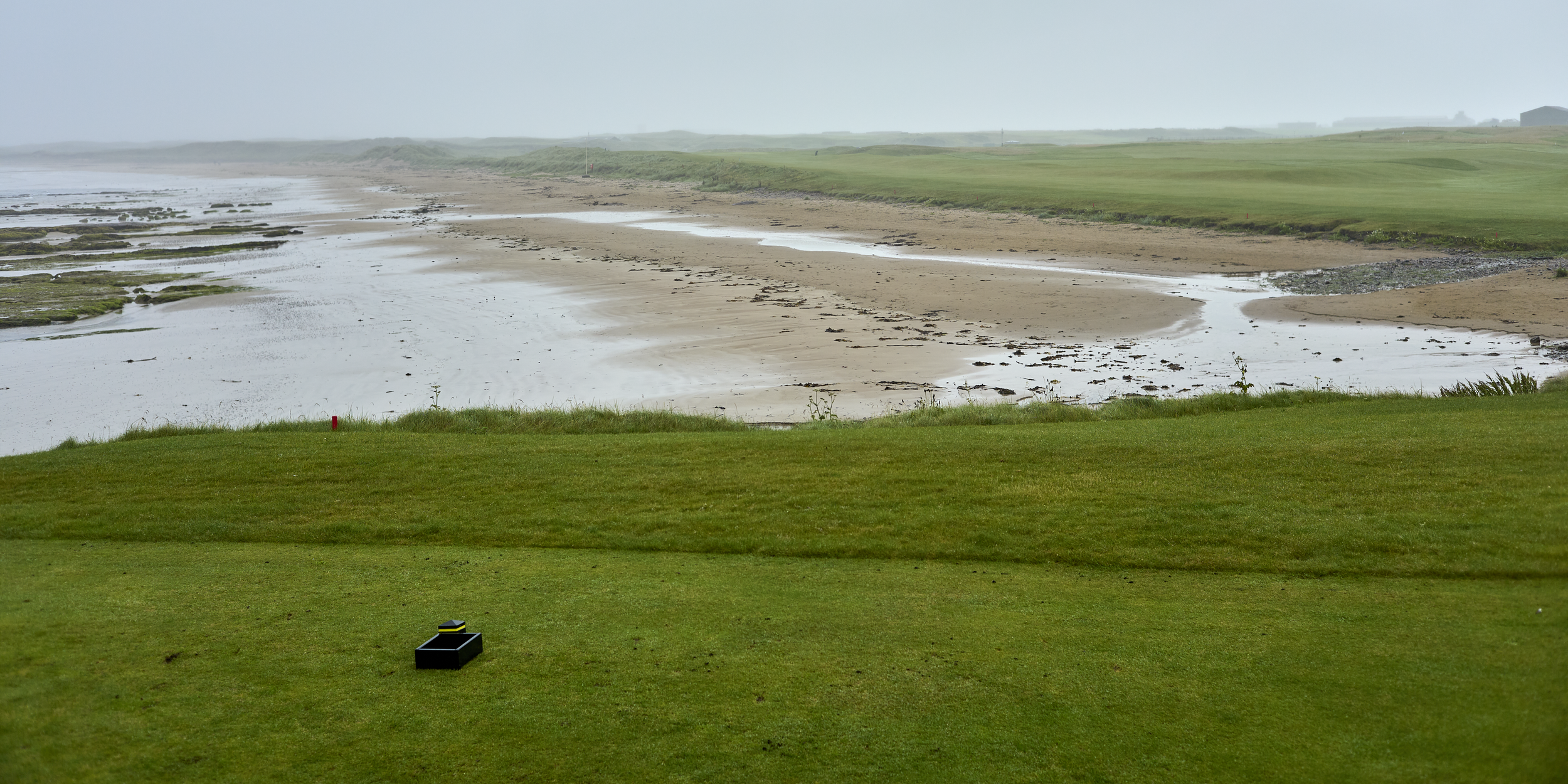 The infamous first tee at Machrihanish with the fairway across from the Atlantic Ocean and Machrihanish Beach